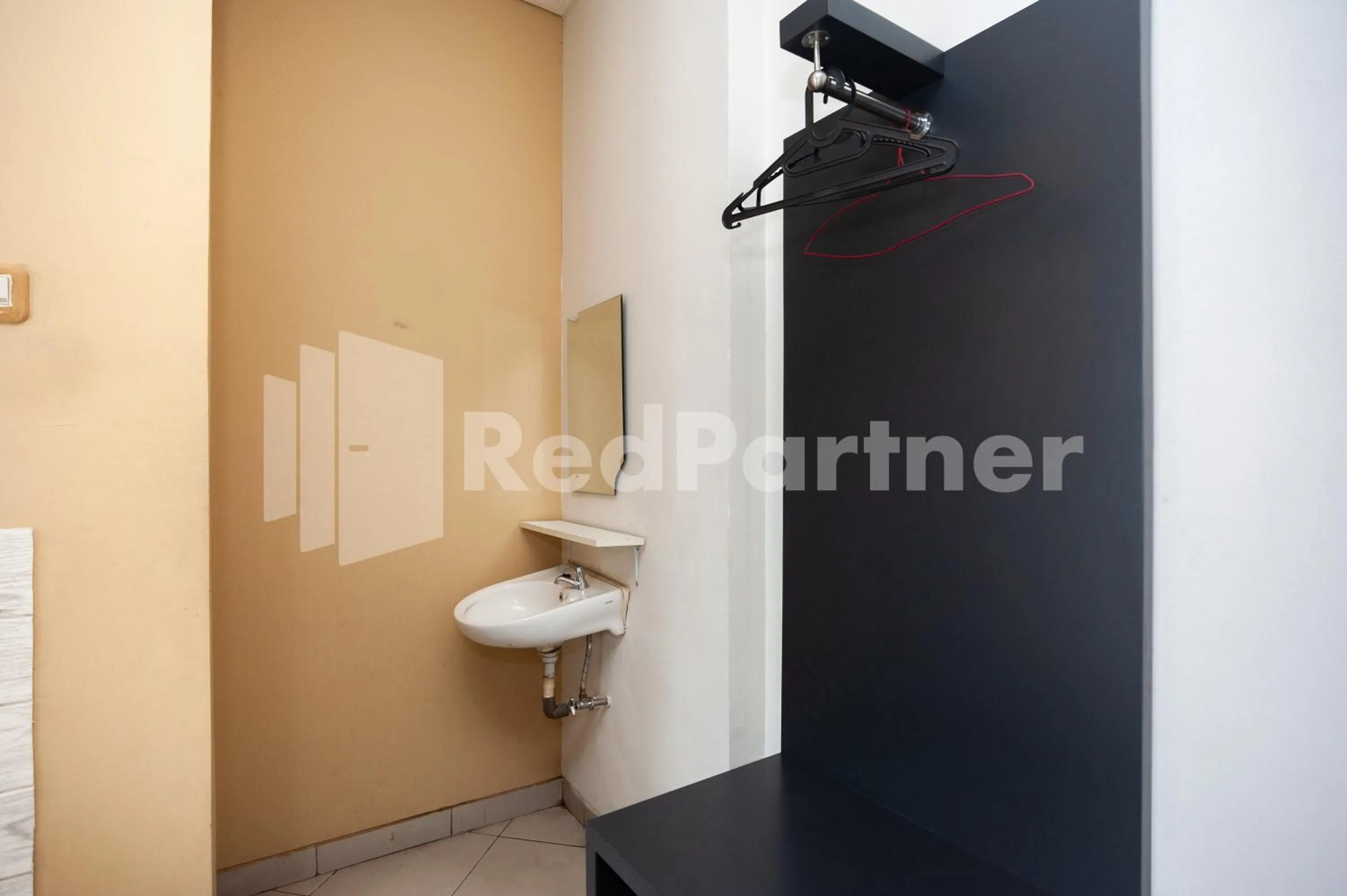Bathroom in One 2 Residence near Slipi Jaya Mall Mitra RedDoorz