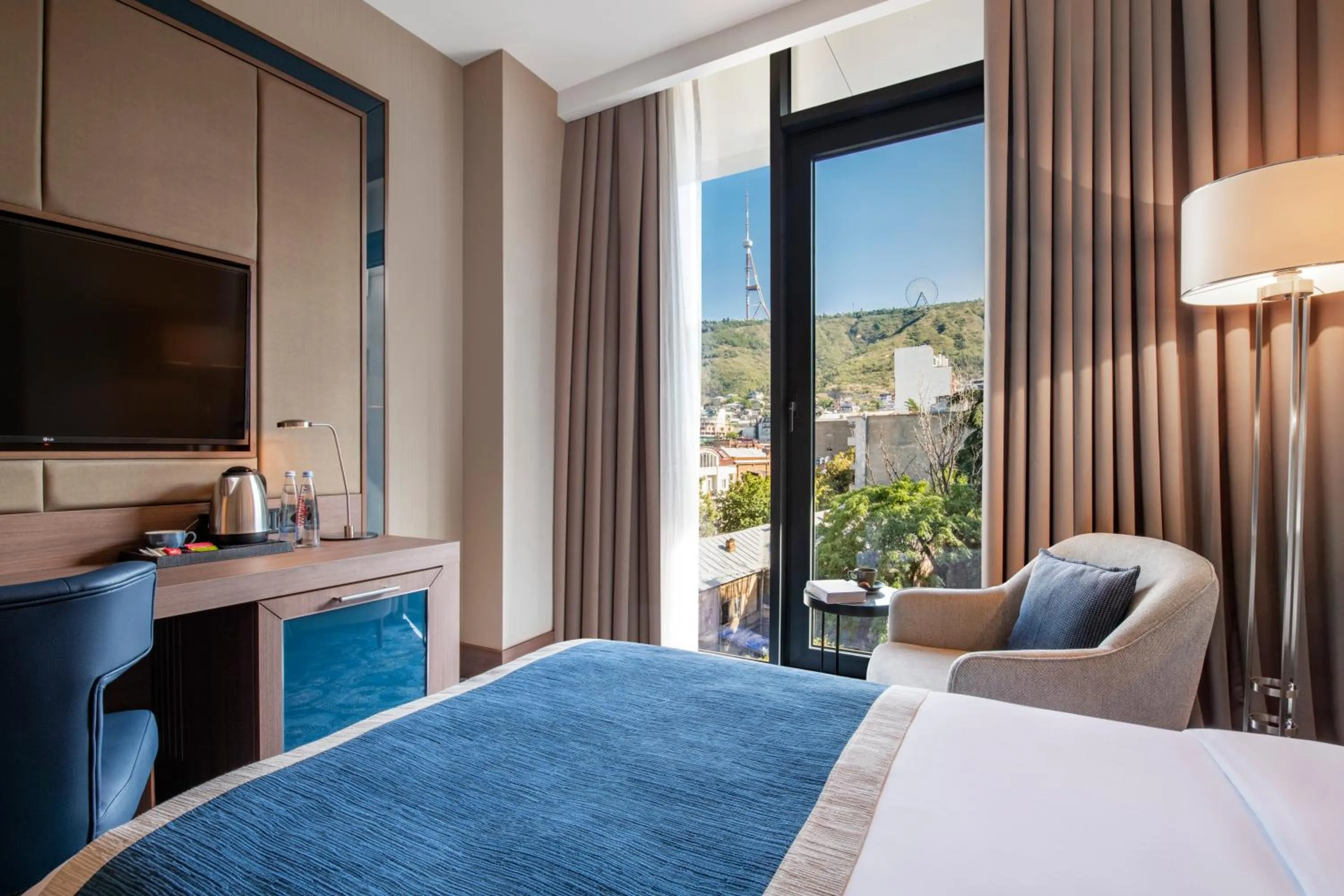 Bed in Tbilisi Philharmonic Hotel by Mercure