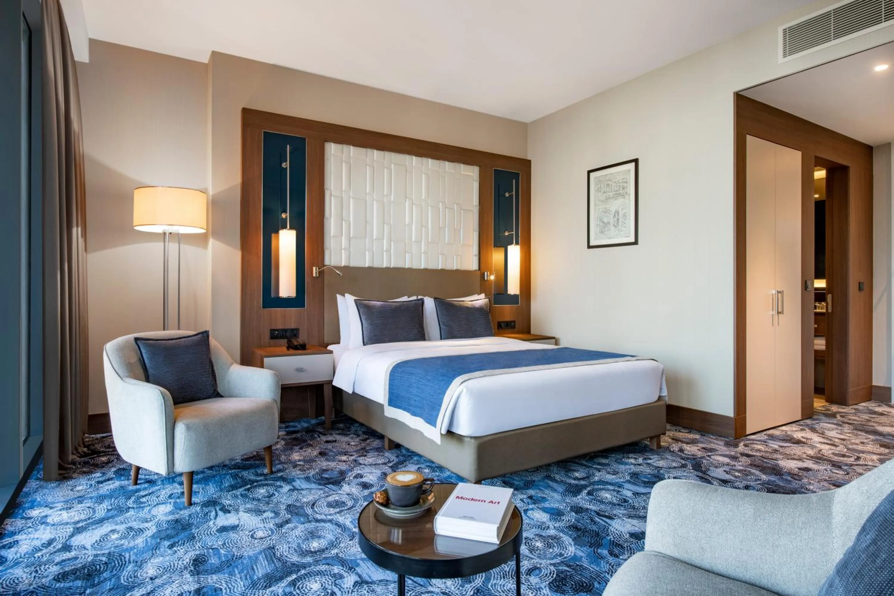 Seating area, Bed in Tbilisi Philharmonic Hotel by Mercure