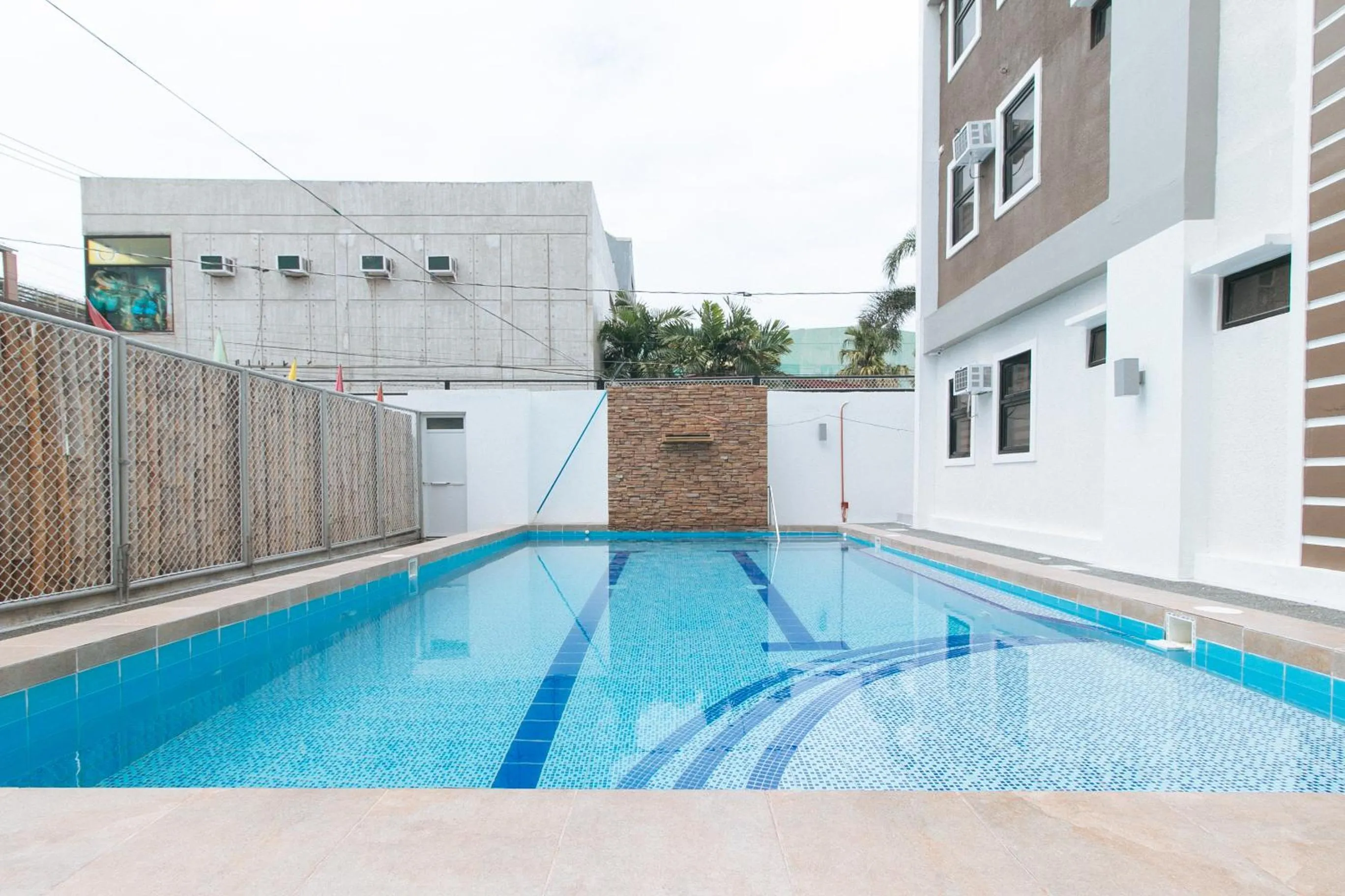 Swimming pool in RedDoorz Plus at DBuilders Poblacion BGC