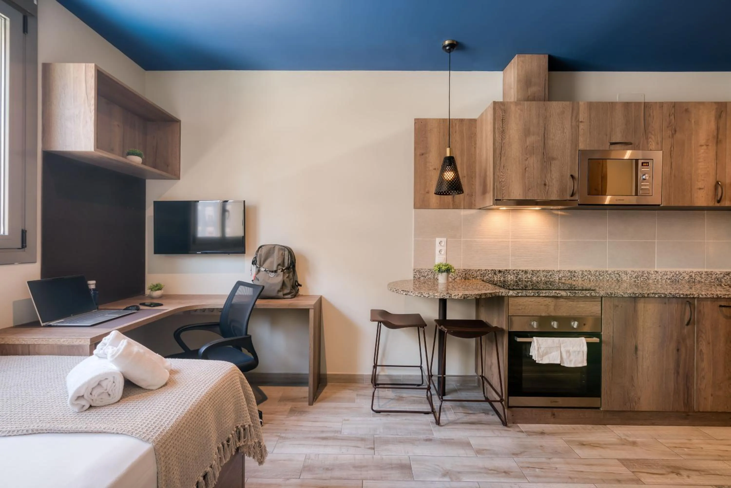 stove in Livensa Living Studios Valencia Marina Real Hotel-Apartamento