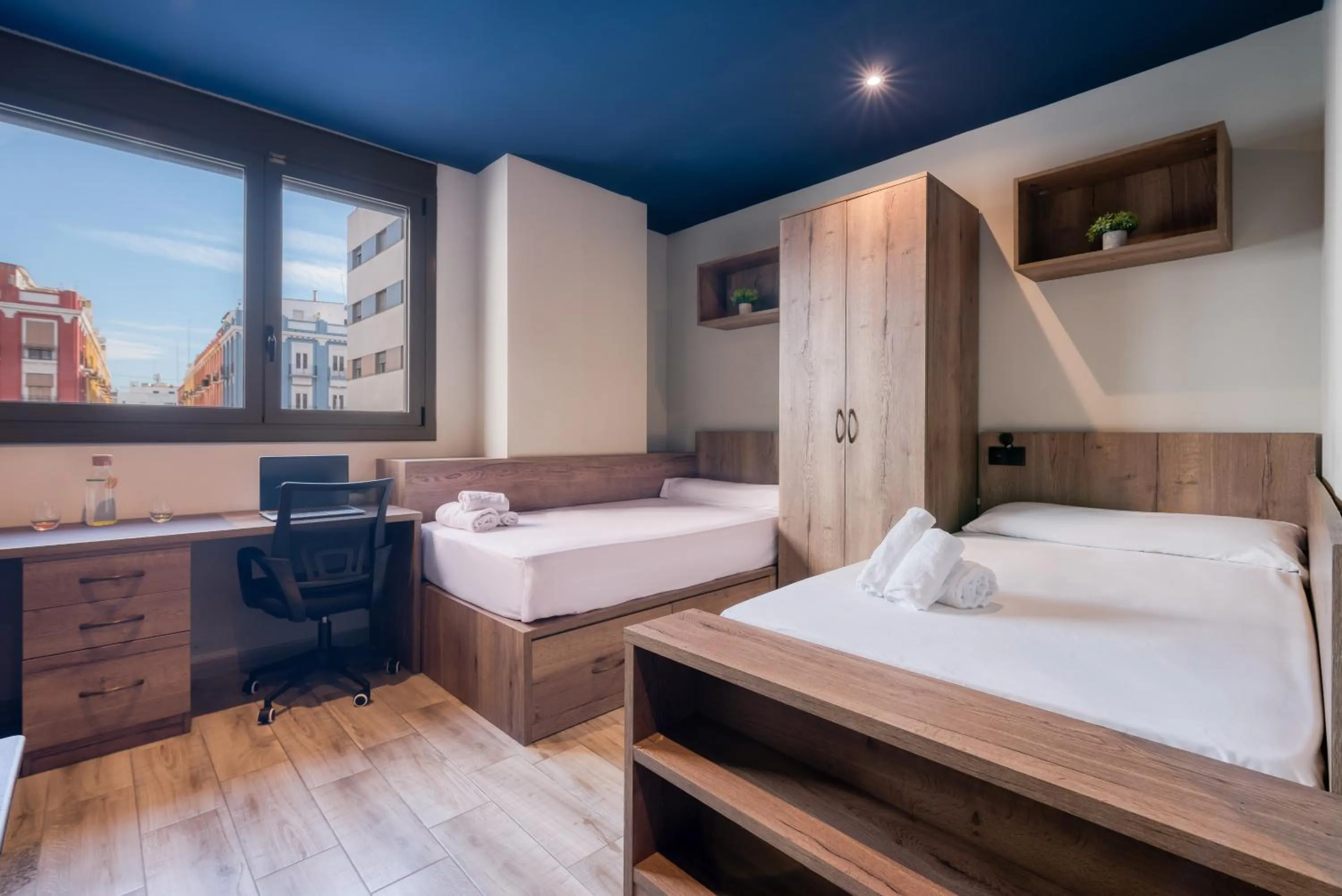 Bed in Livensa Living Studios Valencia Marina Real Hotel-Apartamento