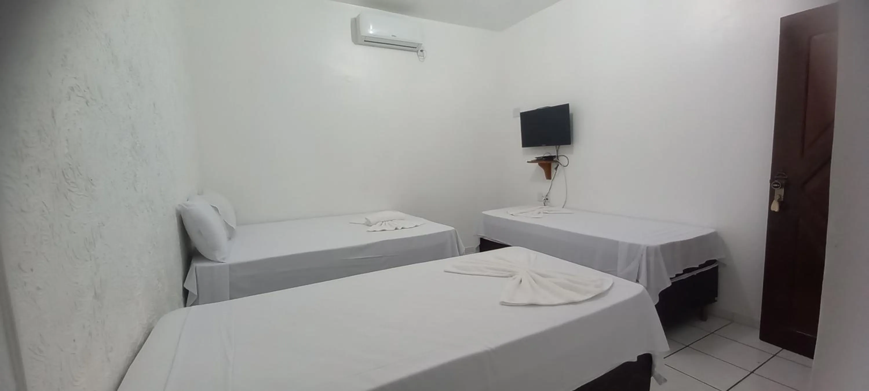 Bed in Pousada Casa Grande