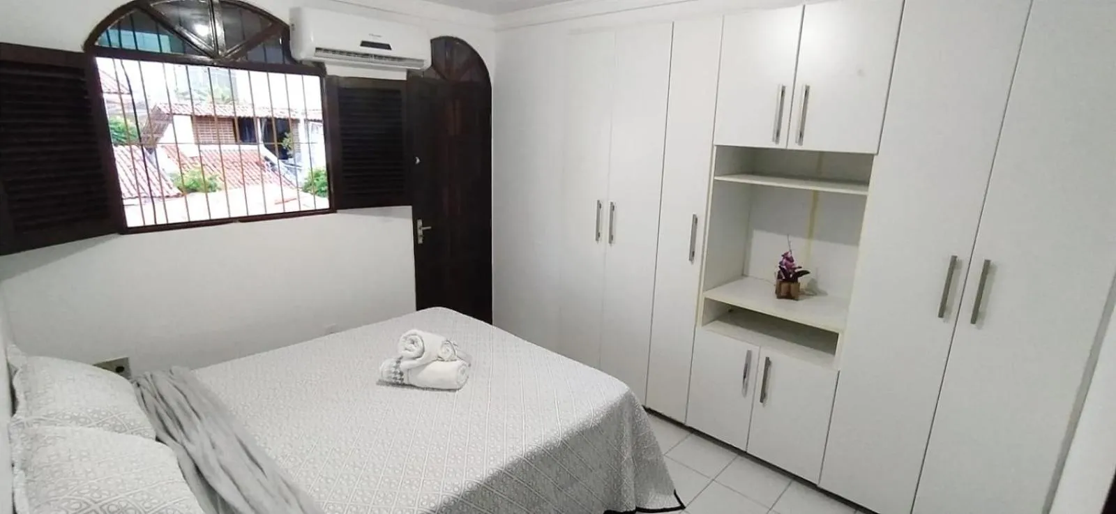 Bed in POUSADA VENTO NORTE CAMA & CAFÉ SUÍTES INDIVIDUAIs