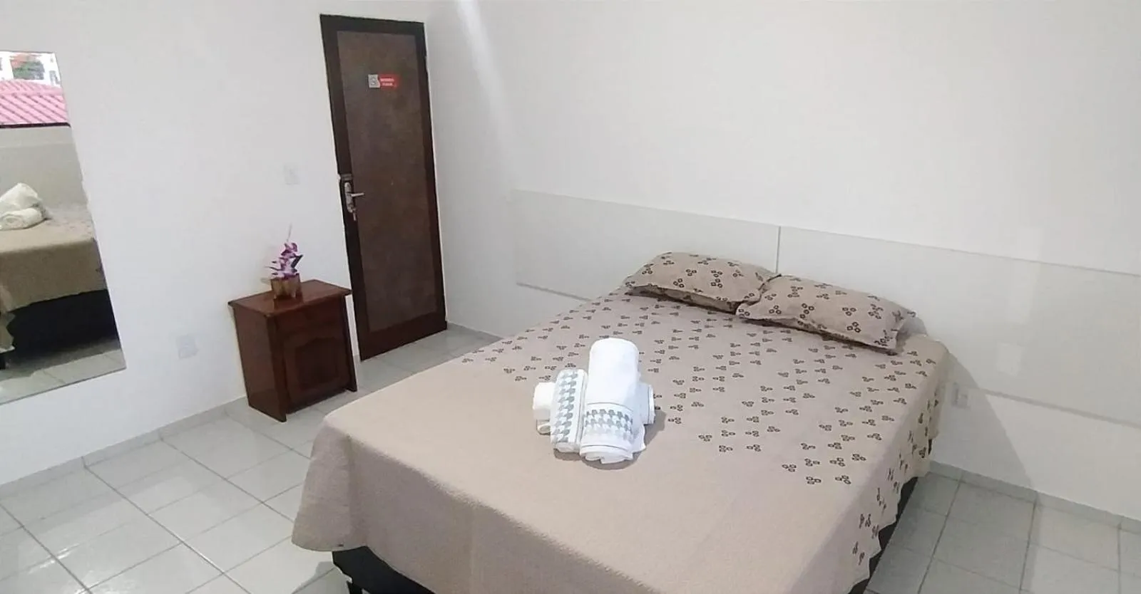 Bed in POUSADA VENTO NORTE CAMA & CAFÉ SUÍTES INDIVIDUAIs