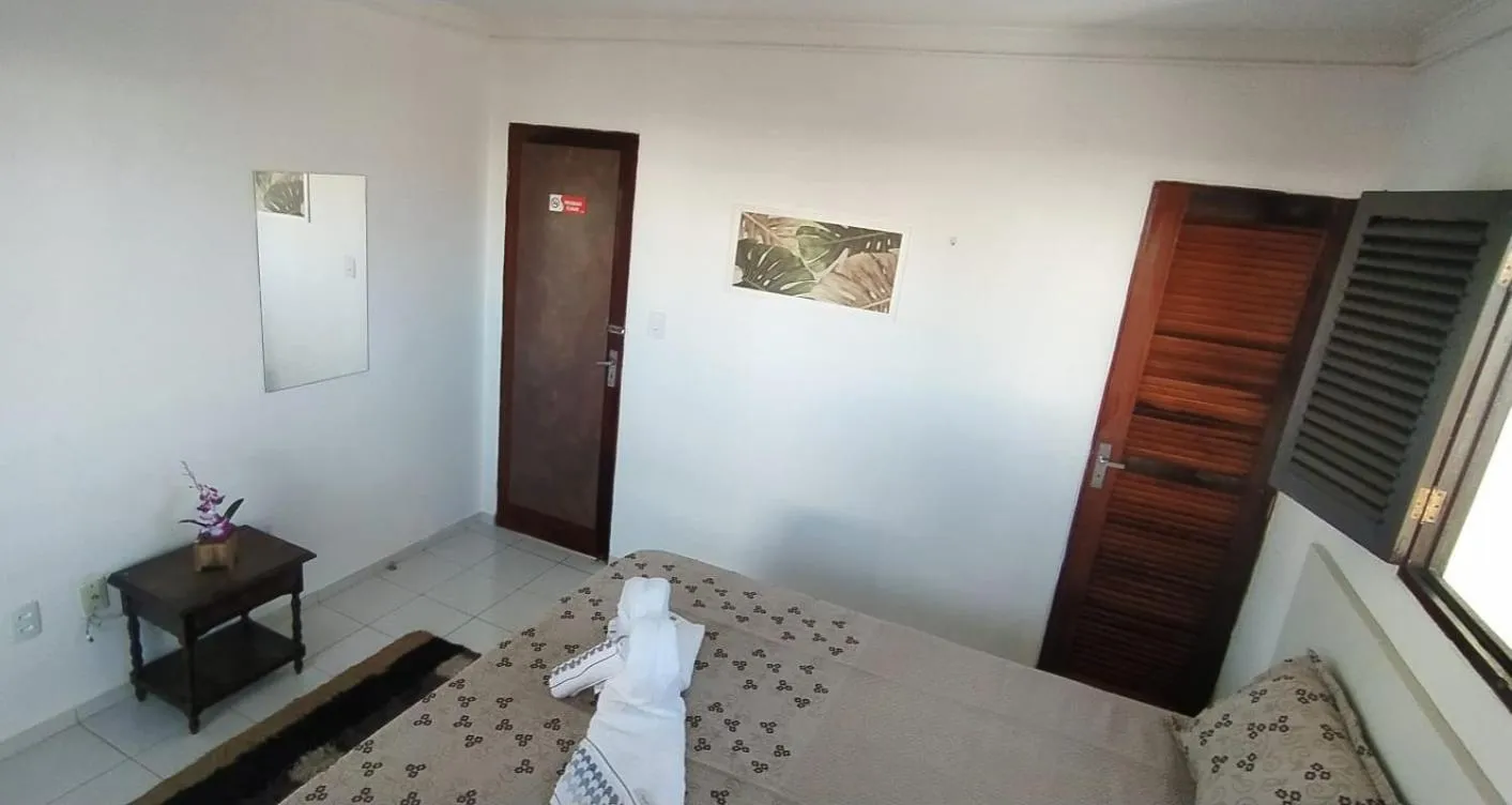 Bed in POUSADA VENTO NORTE CAMA & CAFÉ SUÍTES INDIVIDUAIs