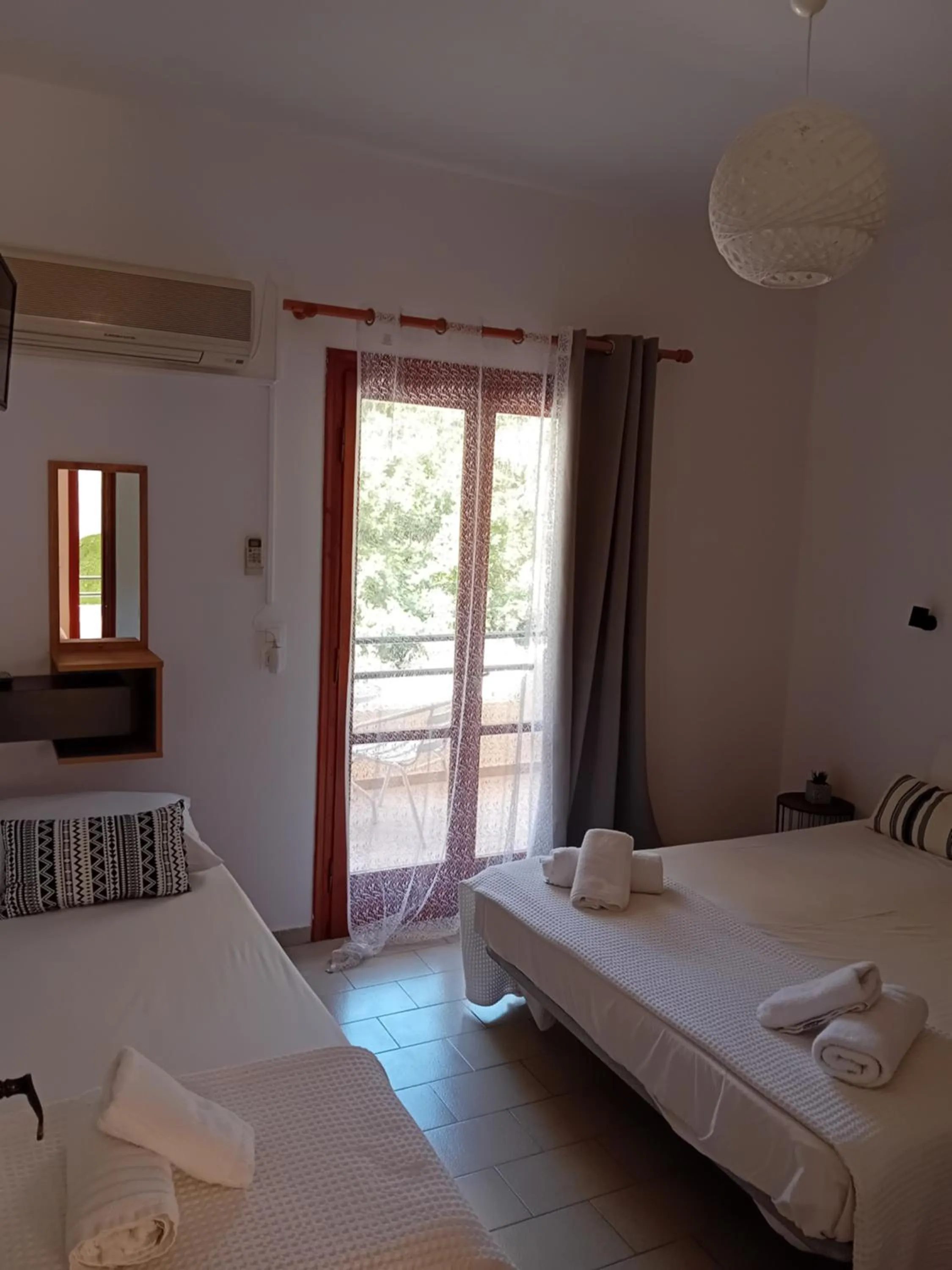 Bed in Φiloxenia Apartments