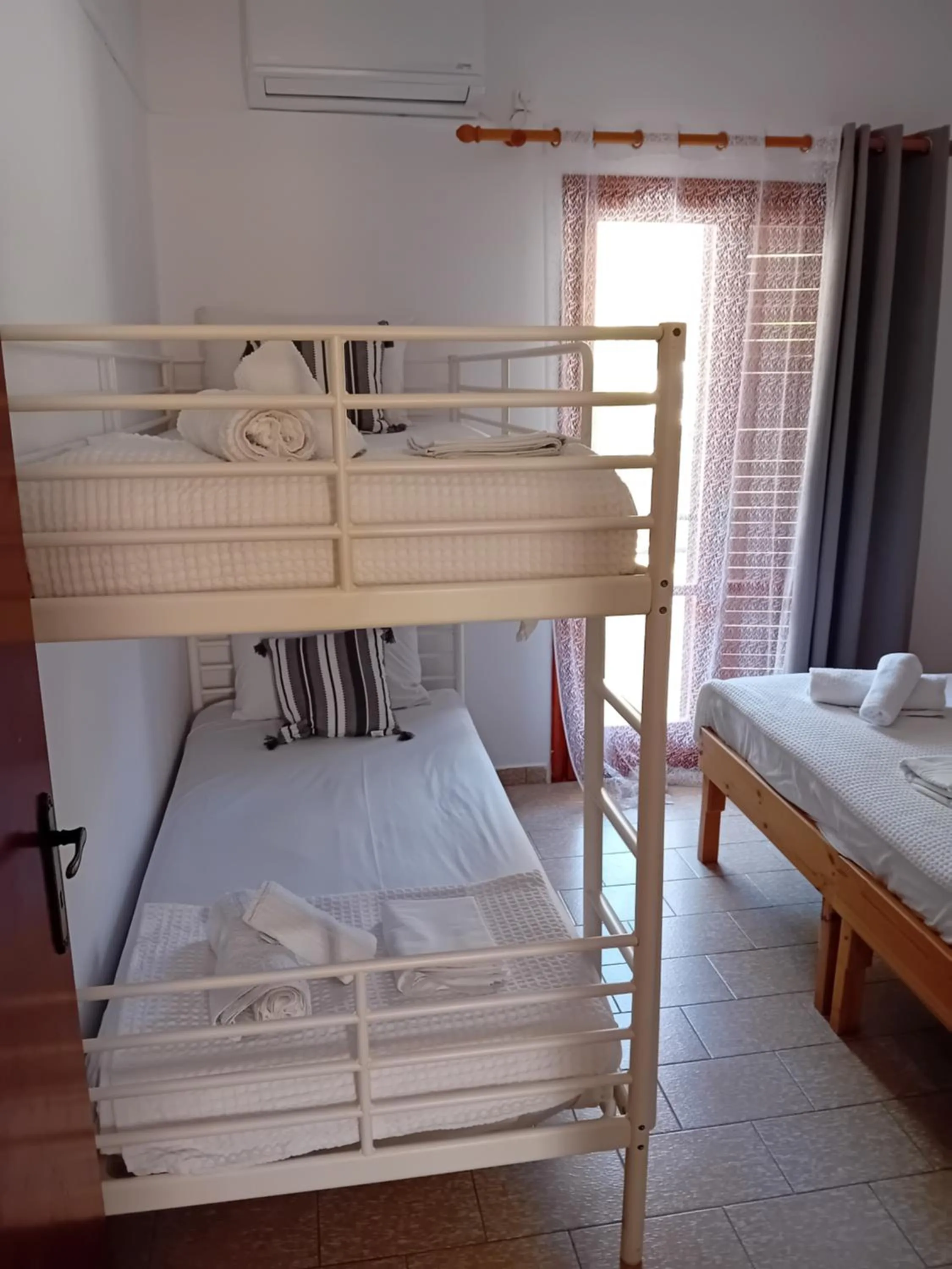Bed in Φiloxenia Apartments
