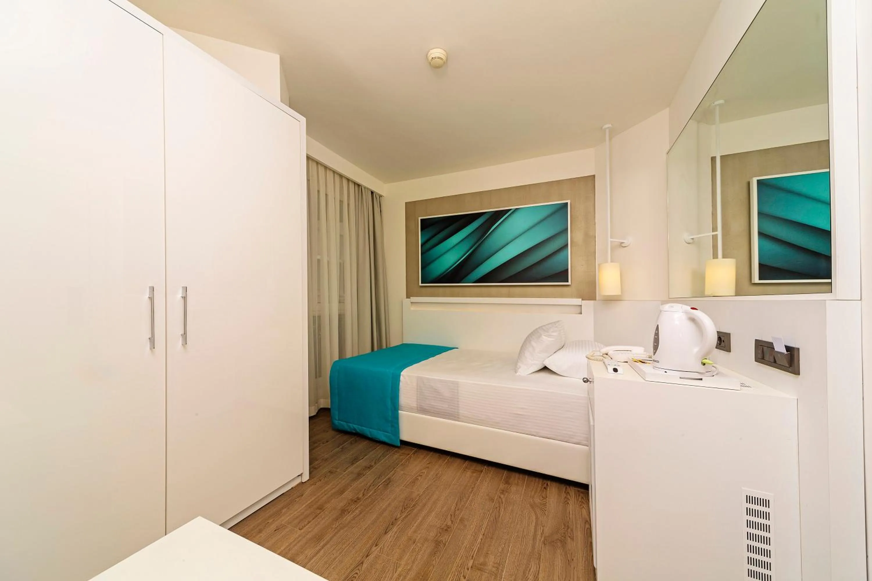 Photo of the whole room, Bed in Poseidon Hotel - Adult Only
