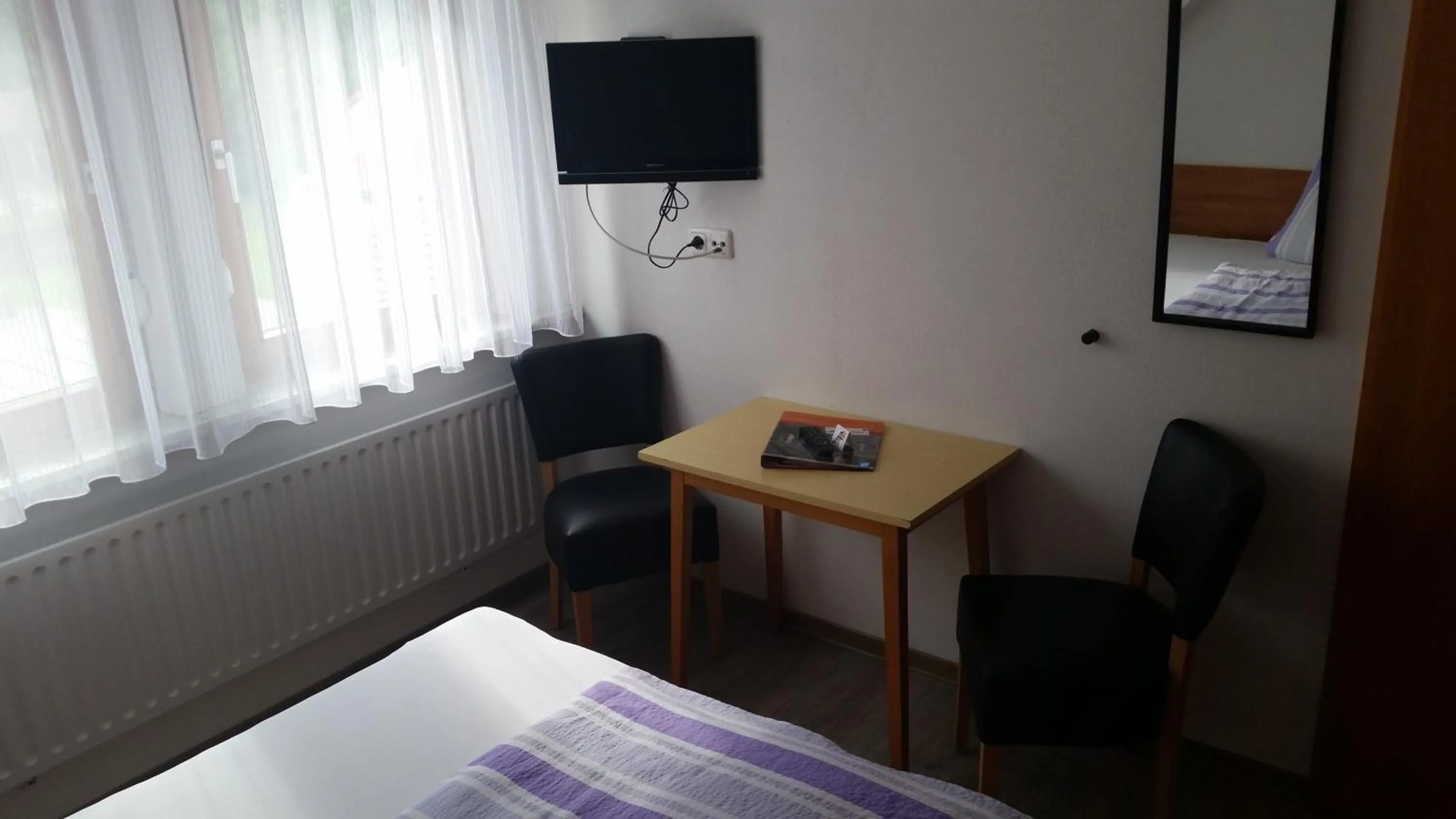 Photo of the whole room, Bed in Gasthof Zur frohen Einkehr