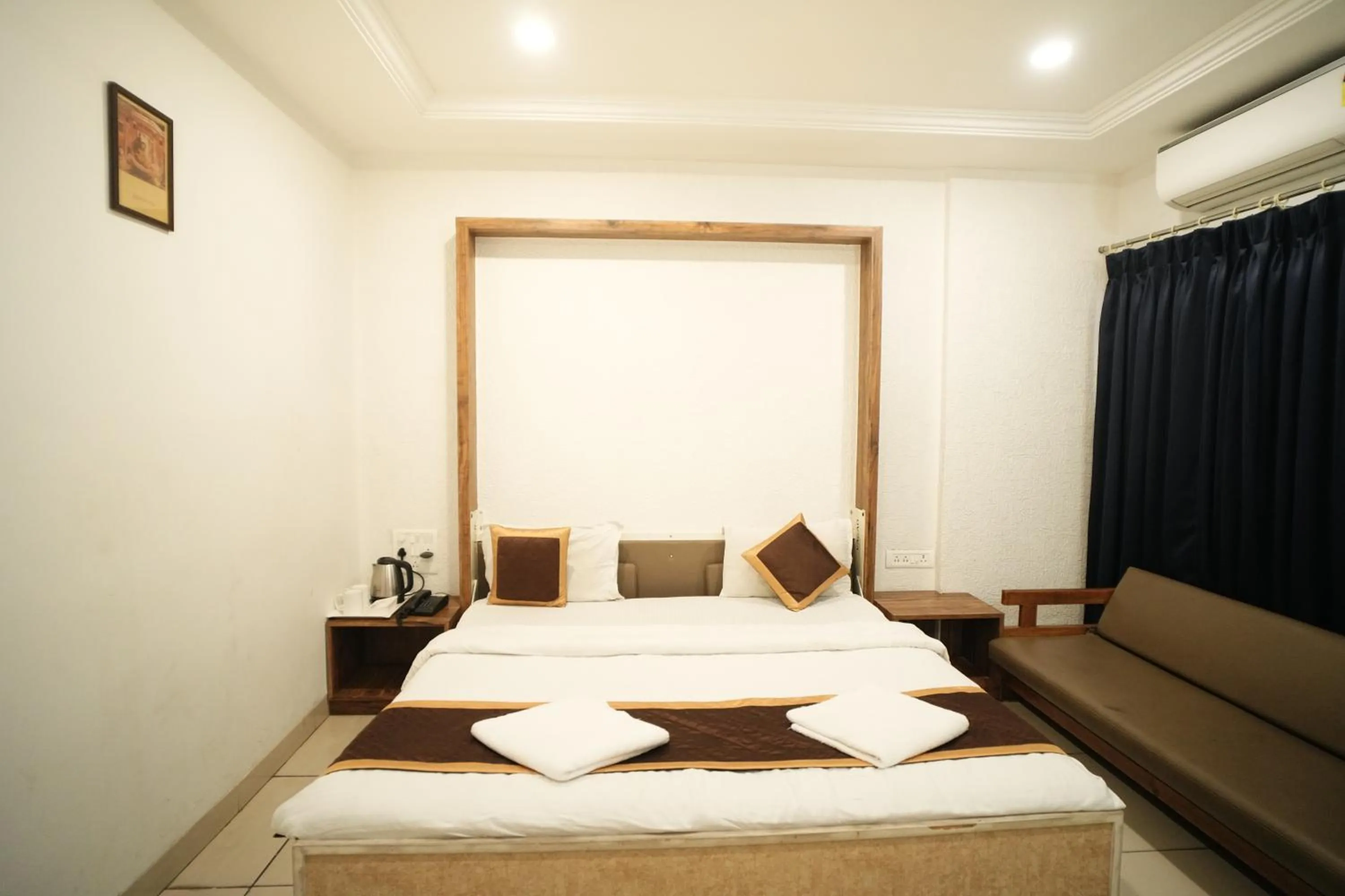 Bed in Hotel Kartiki