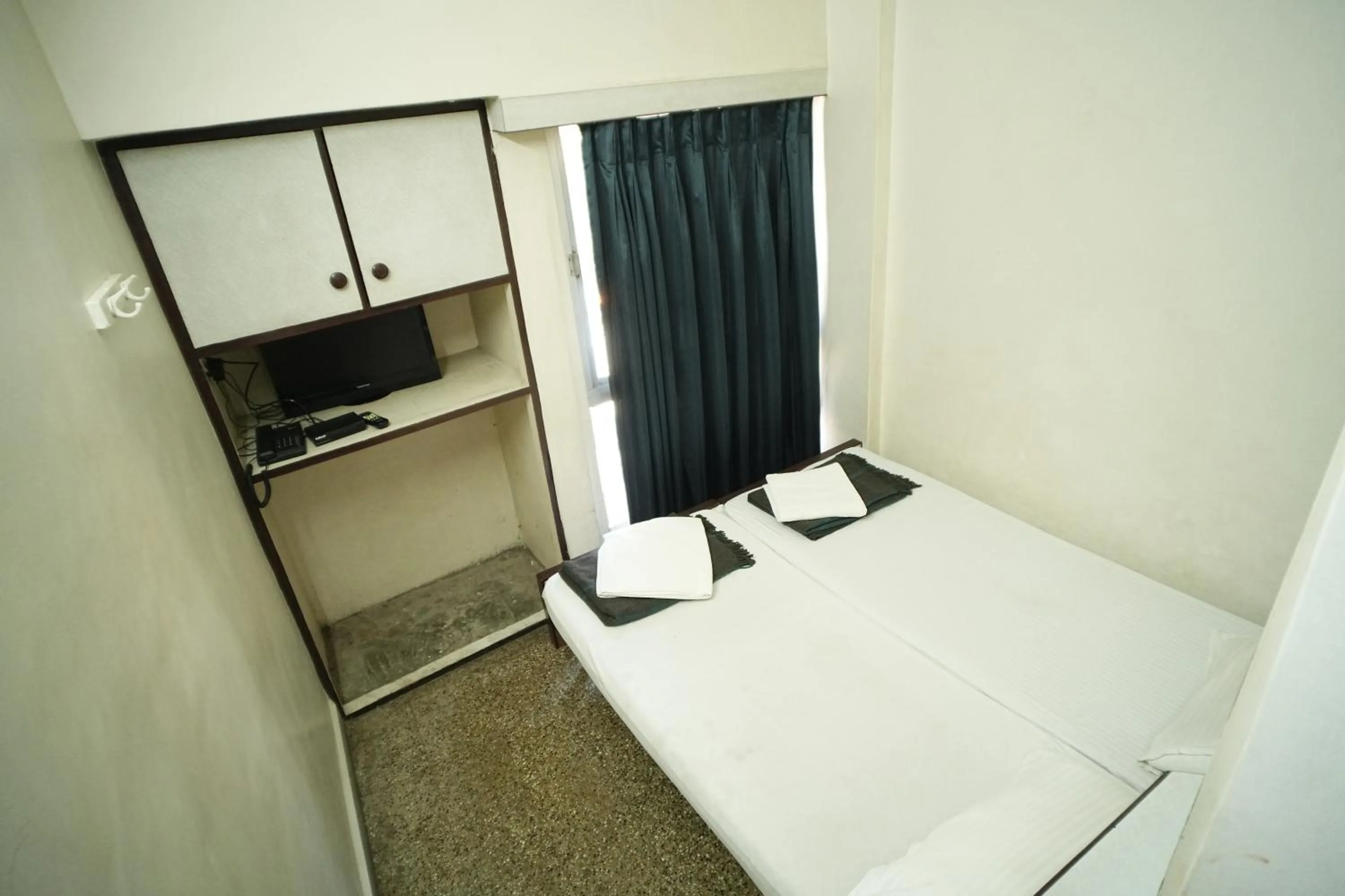 Bed in Hotel Kartiki