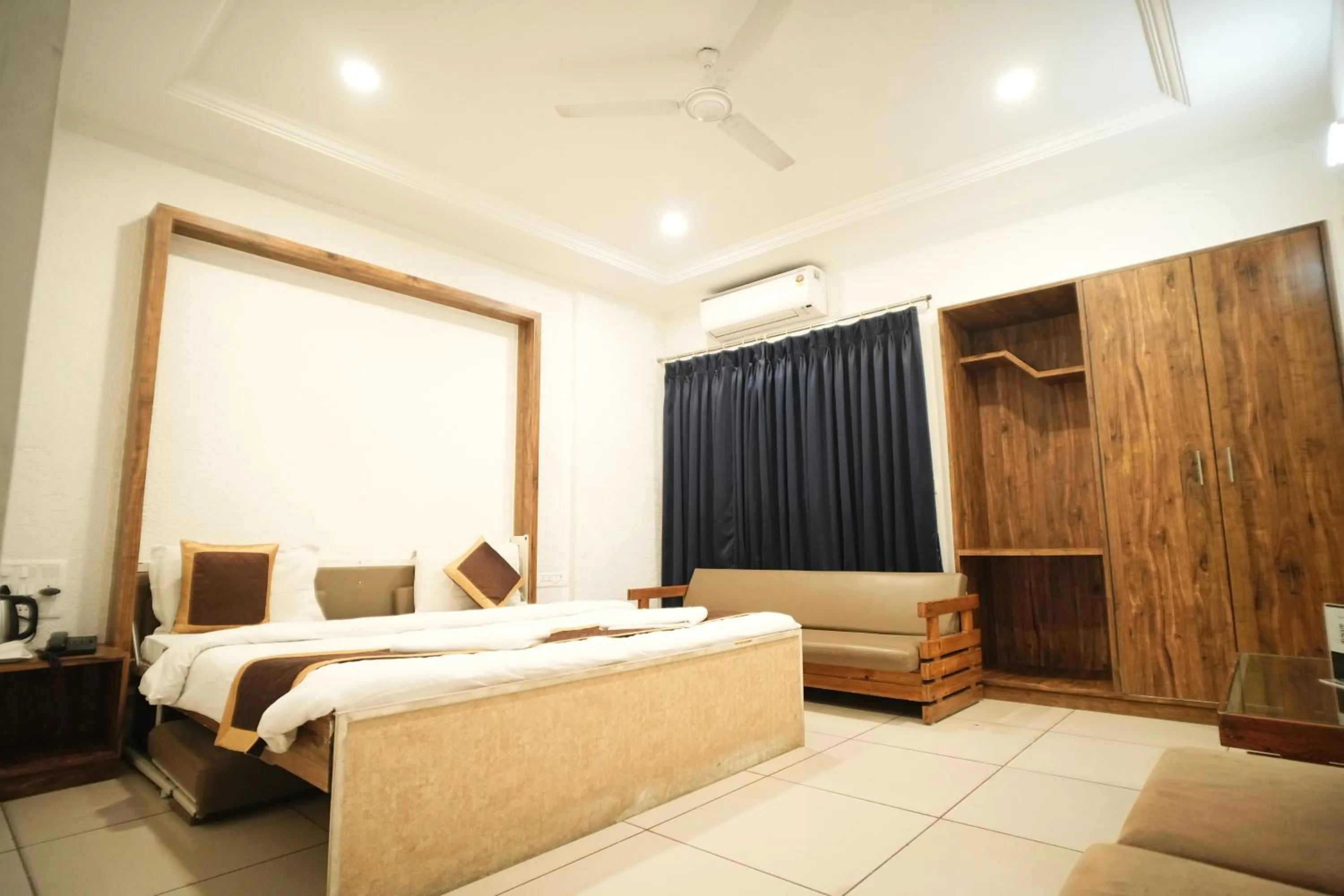 Bed in Hotel Kartiki