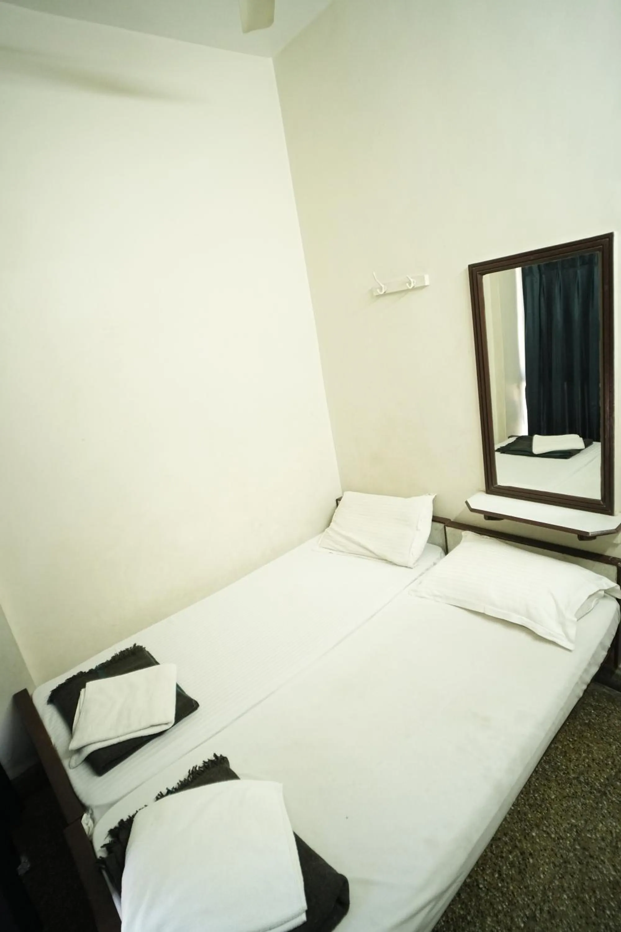 Bed in Hotel Kartiki