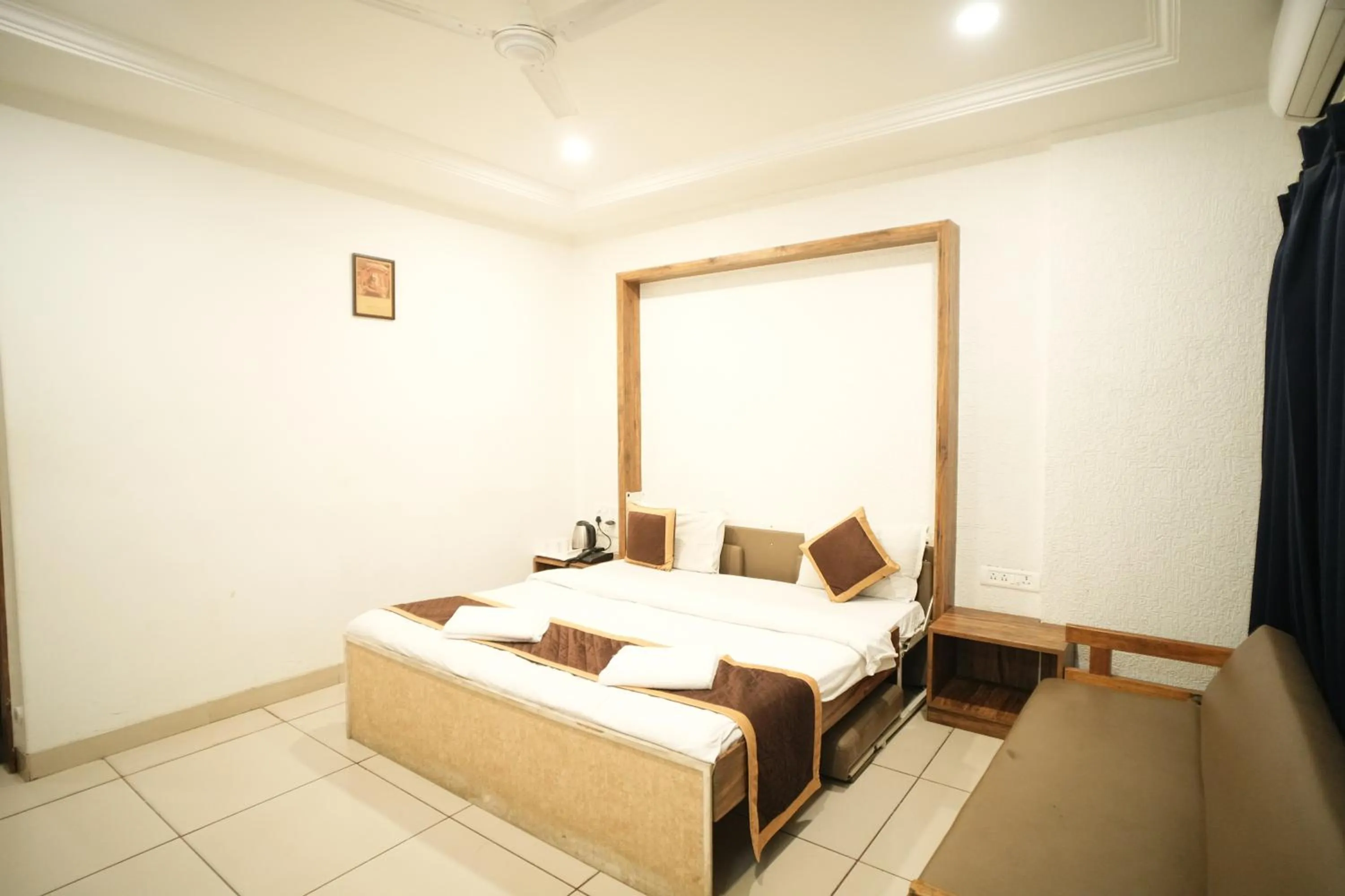 Bed in Hotel Kartiki