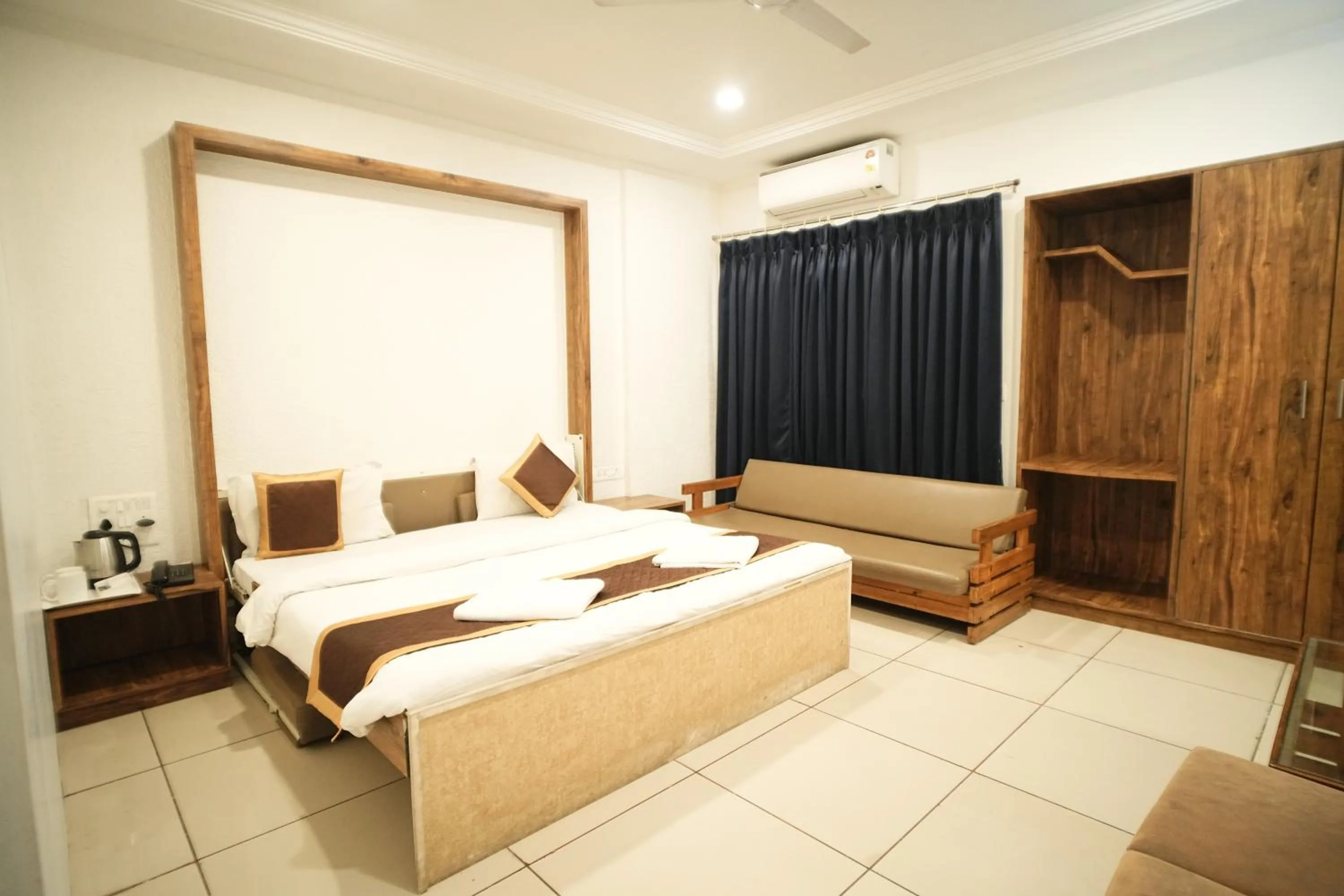 Bed in Hotel Kartiki