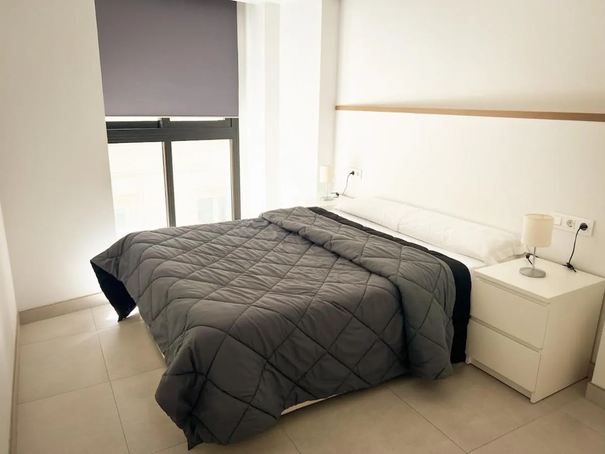 Bed in Palm Suites