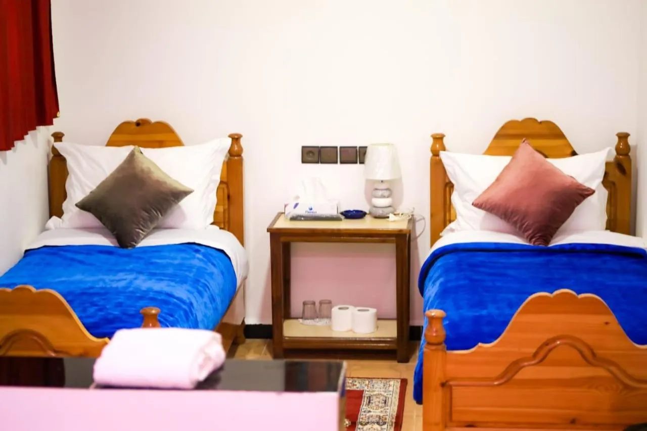 Living room, Bed in Hotel EL MARSA LA PLAYA