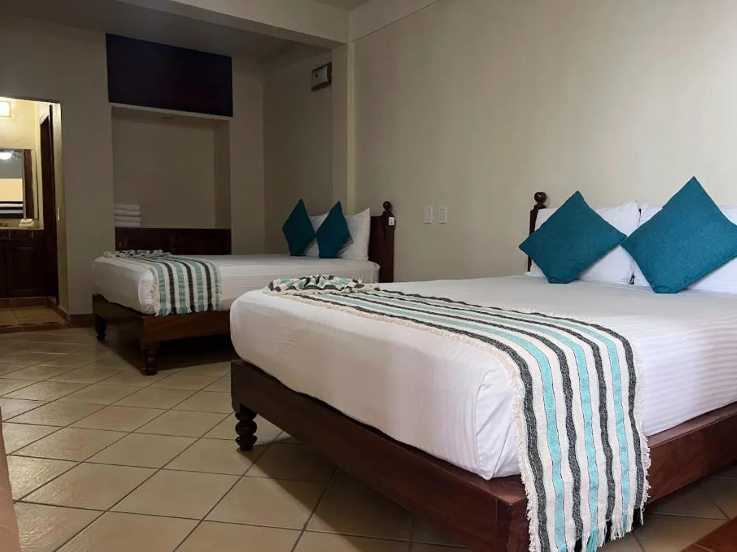 Bed in HOTEL EL CORAL