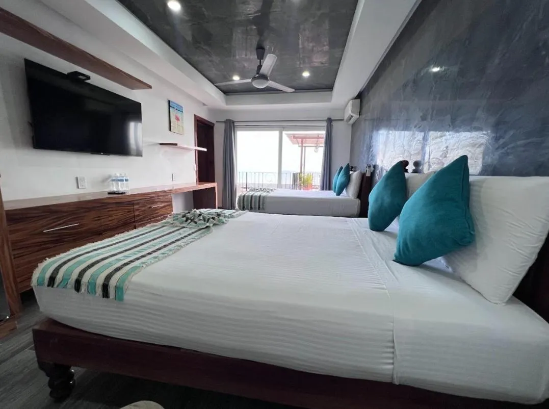 Bed in HOTEL EL CORAL