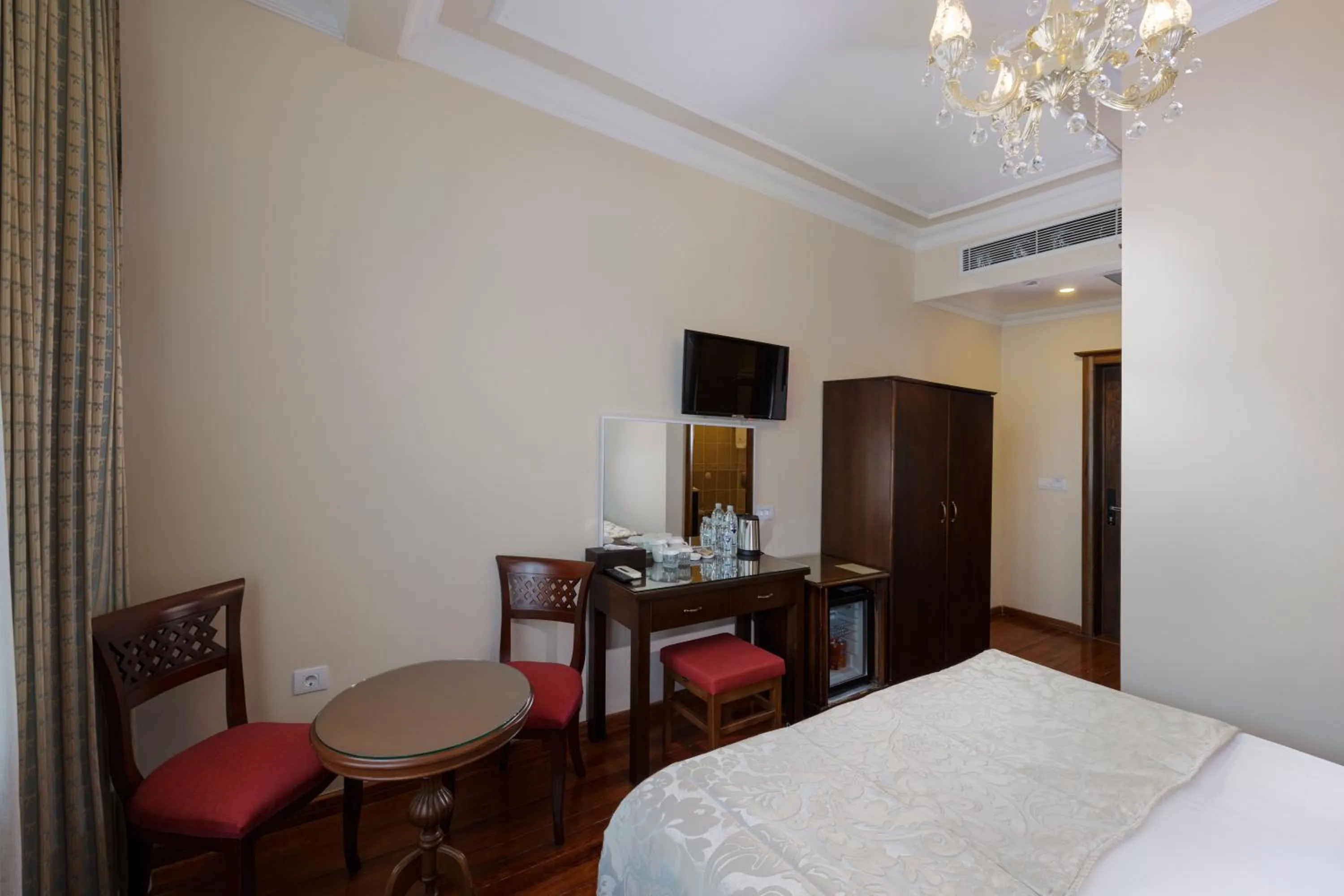 Seating area, Bed in Seven Hills Hotel - Special Category