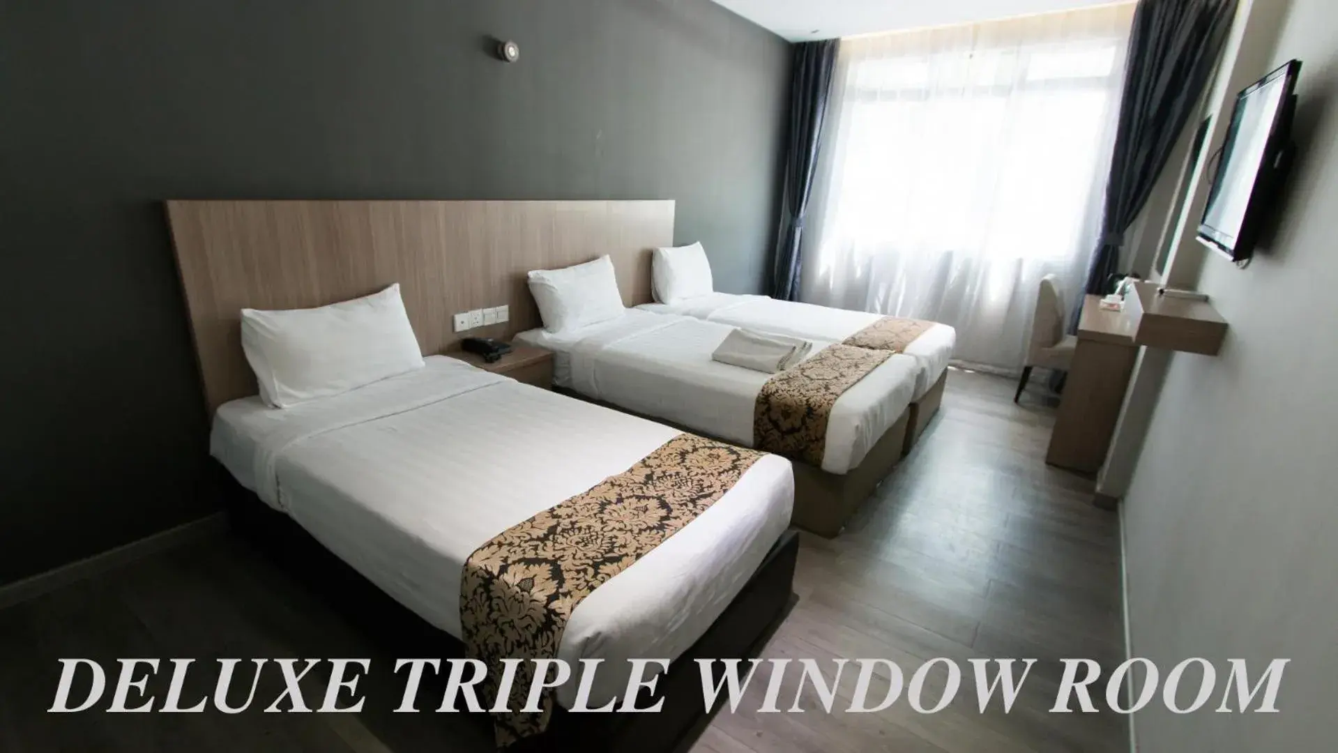Deluxe Triple Room in Hotel 99 Kuala Lumpur City Deluxe Triple Room in Hotel 99 Kuala Lumpur City