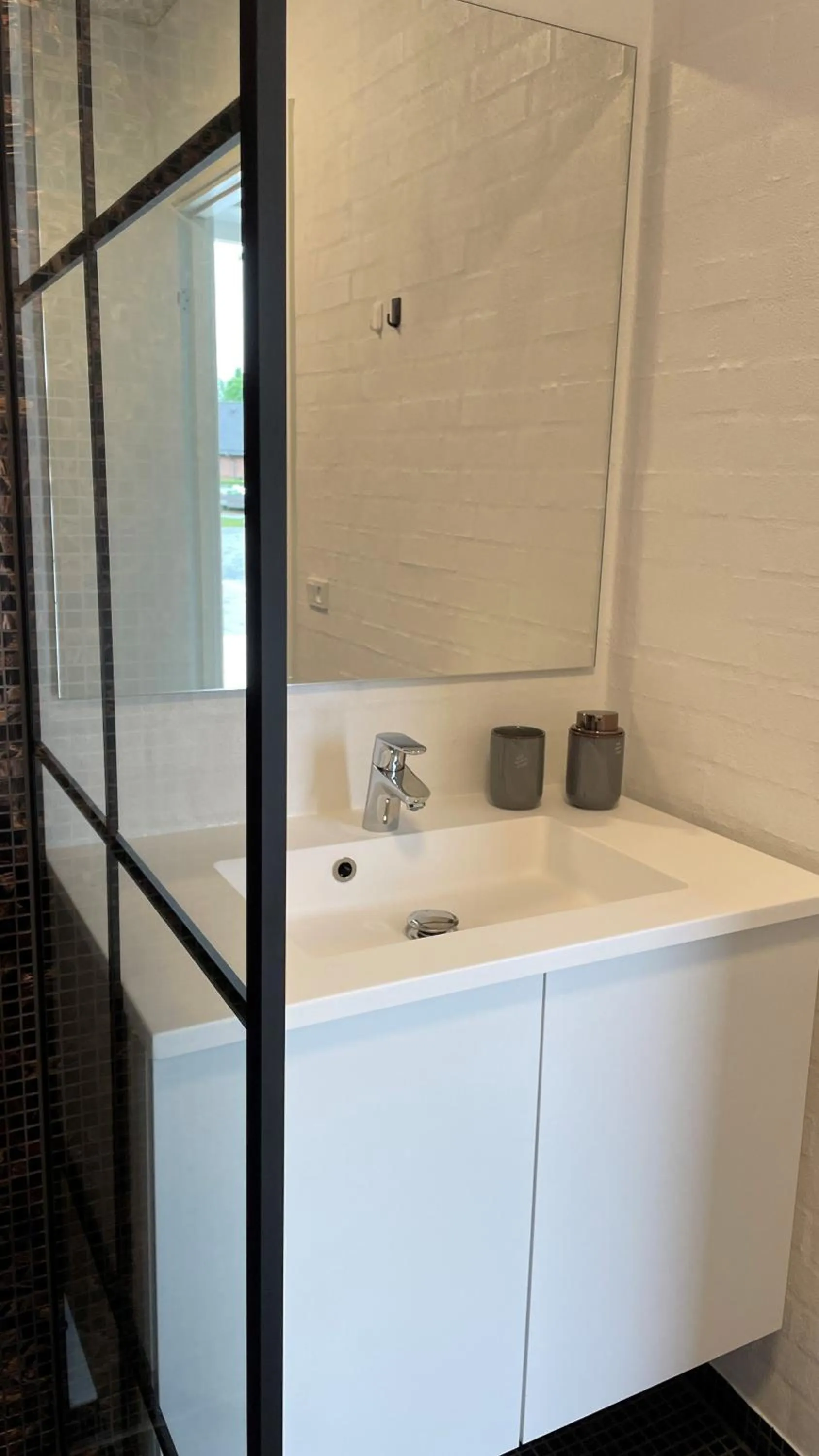 Bathroom in Holiday Rooms Møllebo