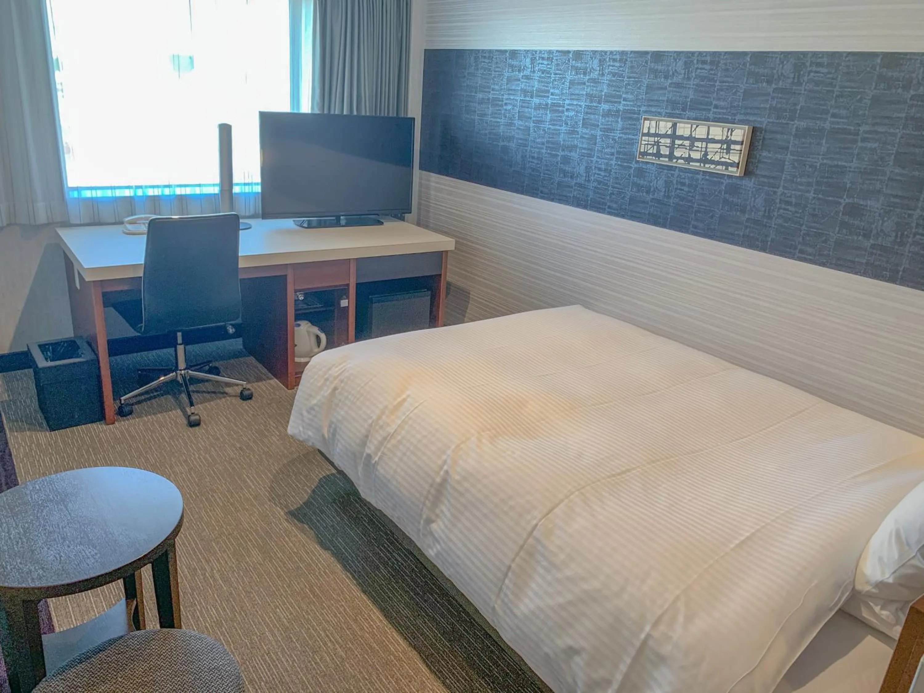 Bed in Richmond Hotel Tokyo Musashino