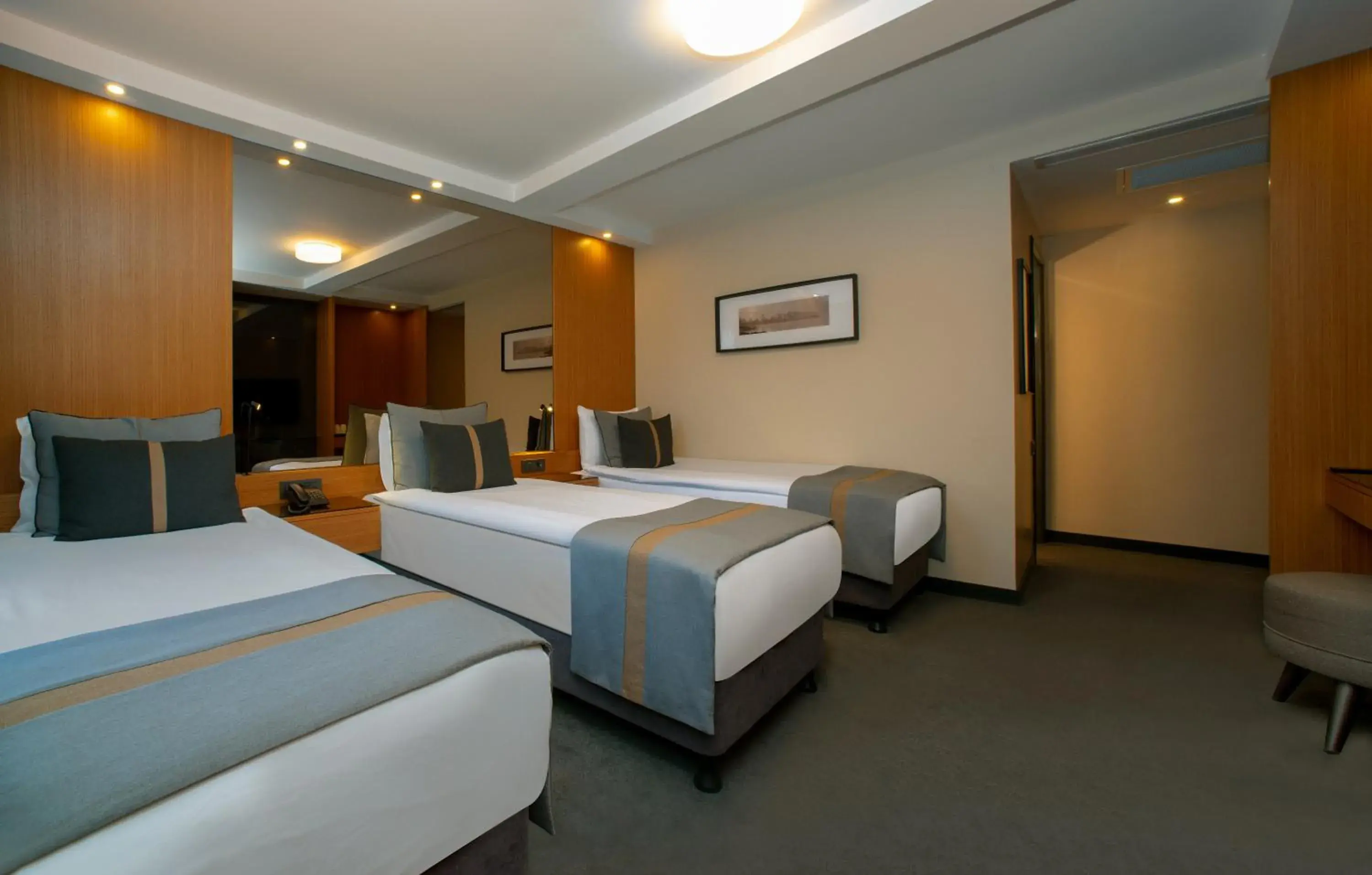Superior Triple Room in Tan Hotel - Special Category Superior Triple Room in Tan Hotel - Special Category