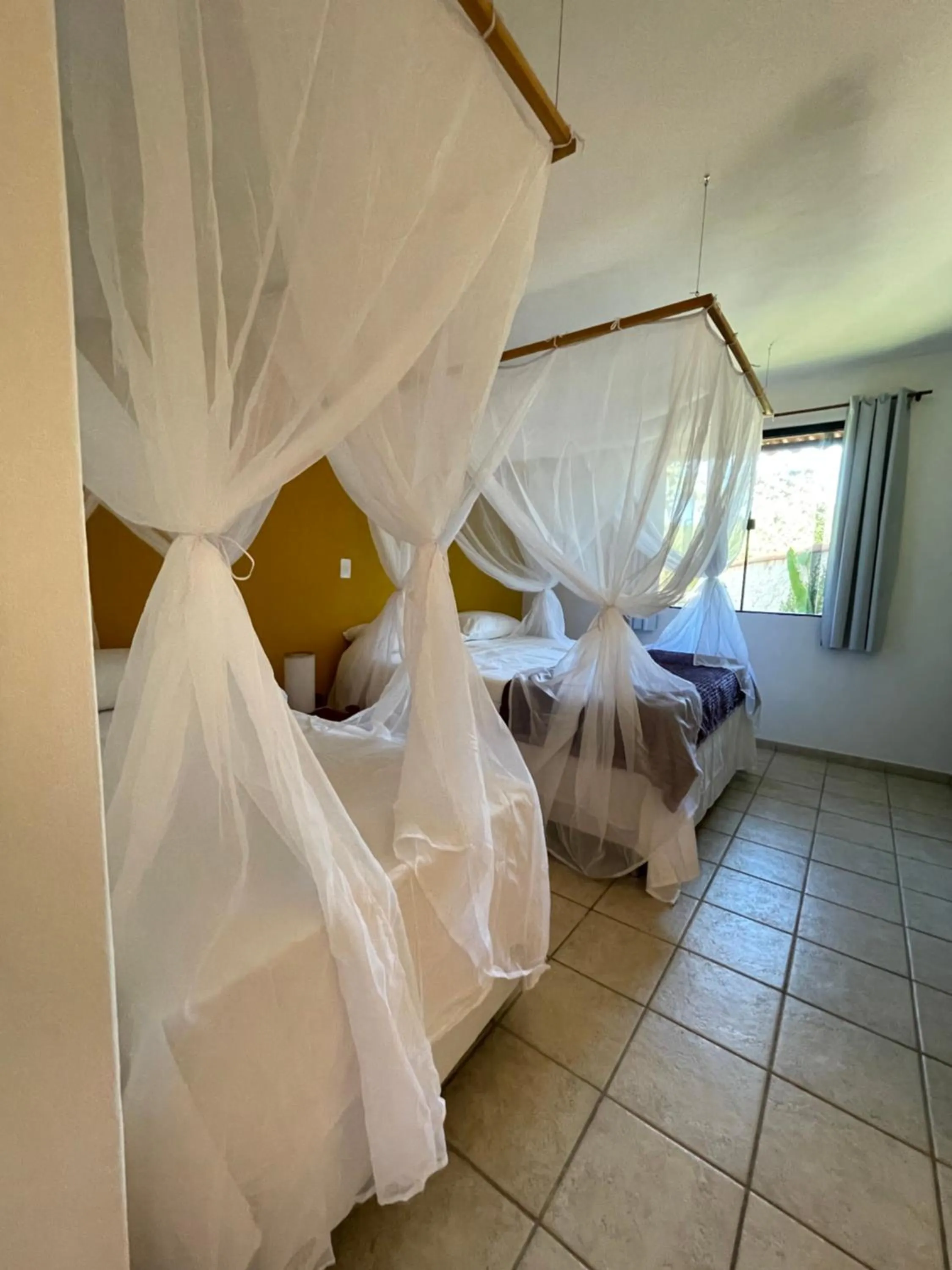 Bed in Pousada Arraial Colonial, Localizada no Centrinho e de Fácil Acesso a Praia e a Rua Mucugê