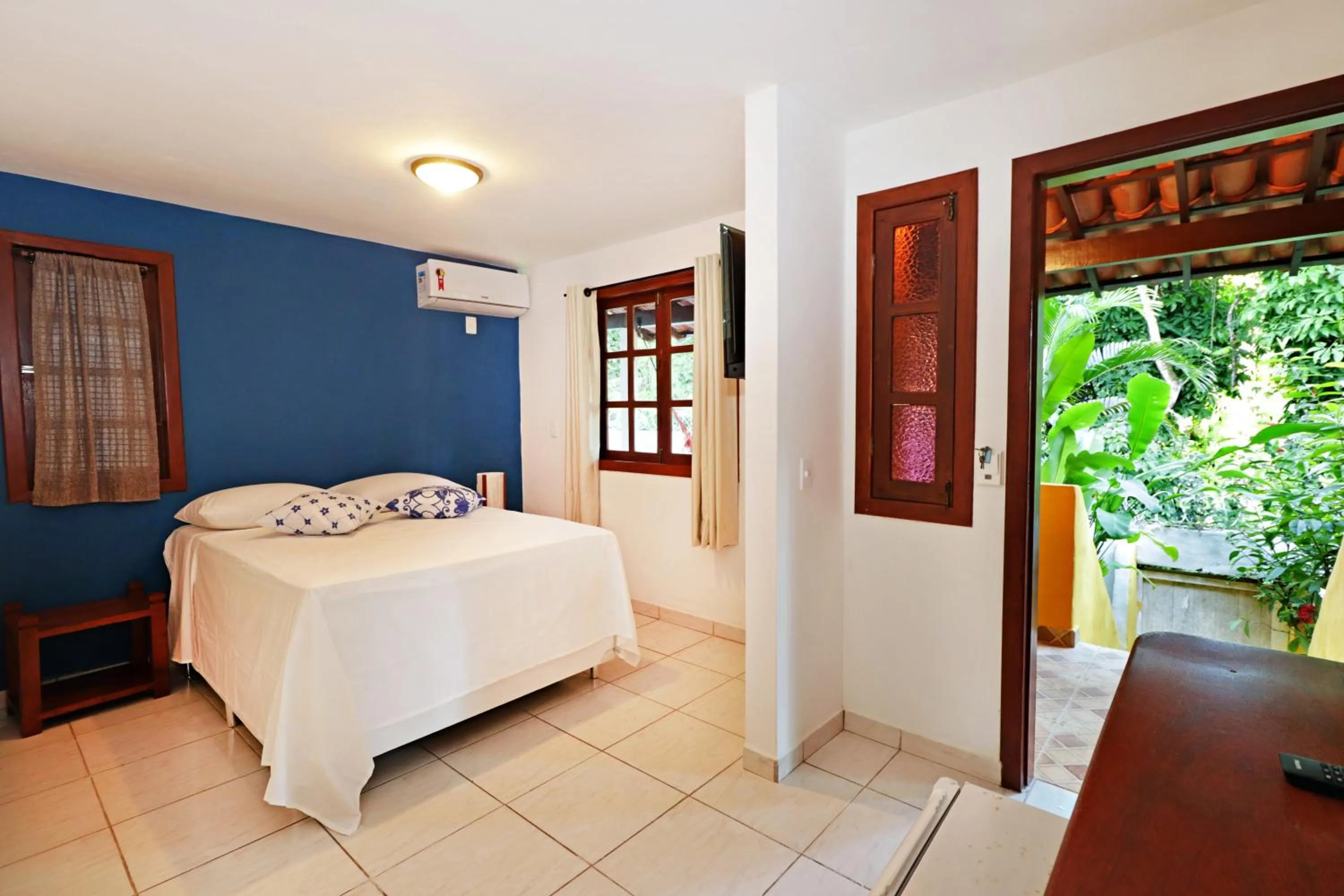 Bed in Pousada Arraial Colonial, Localizada no Centrinho e de Fácil Acesso a Praia e a Rua Mucugê