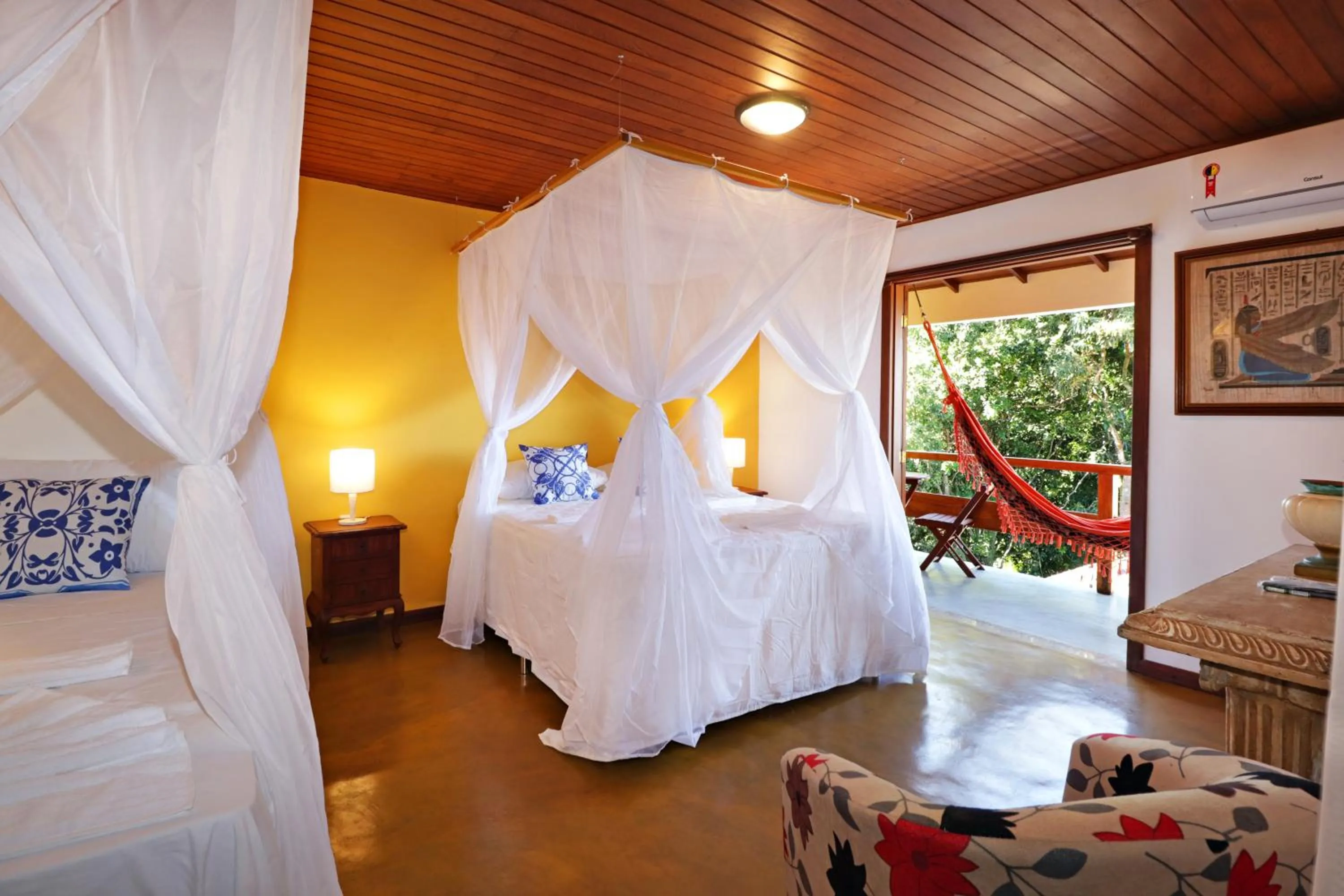 Bed in Pousada Arraial Colonial, Localizada no Centrinho e de Fácil Acesso a Praia e a Rua Mucugê