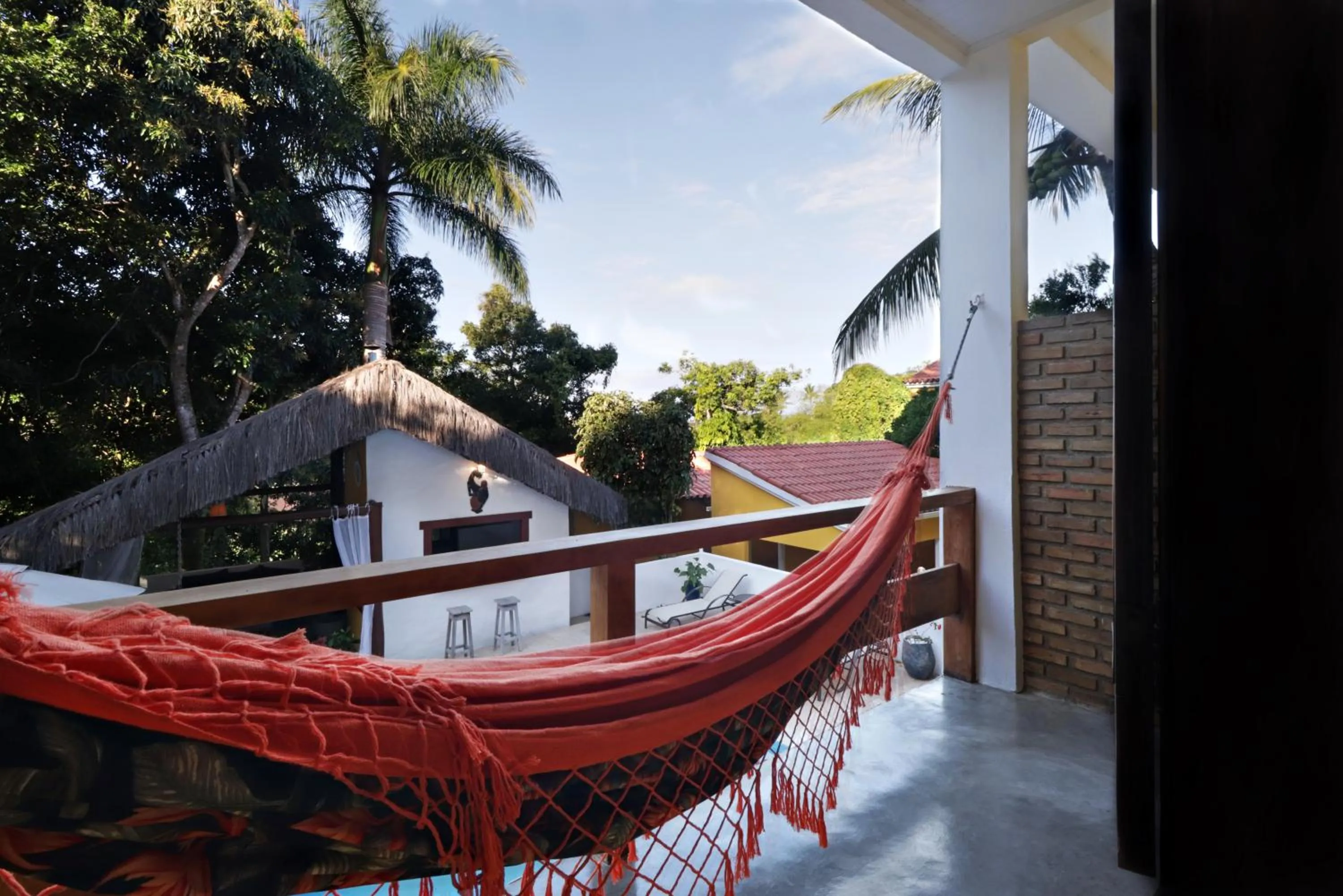 Balcony/Terrace in Pousada Arraial Colonial, Localizada no Centrinho e de Fácil Acesso a Praia e a Rua Mucugê