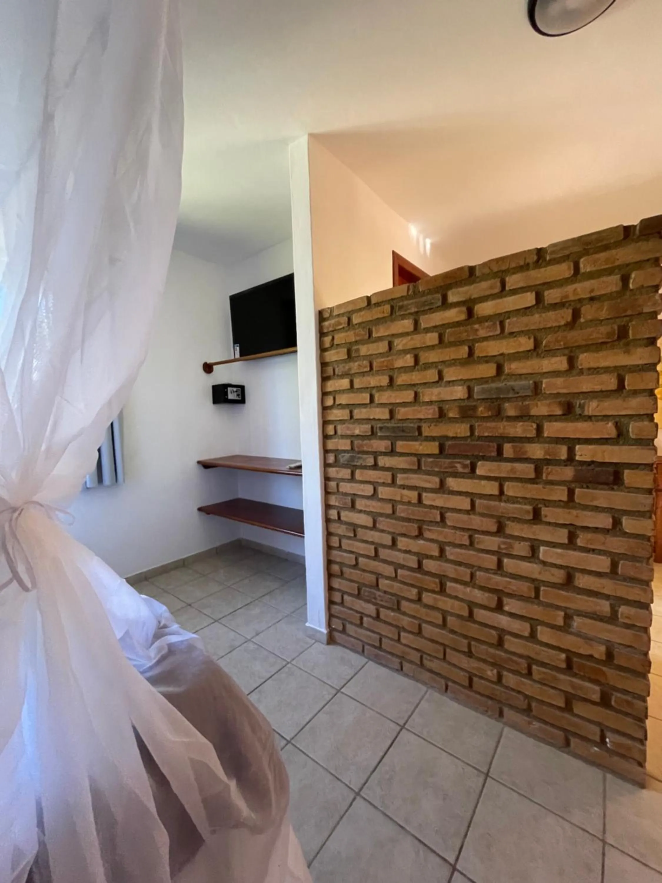 Bed in Pousada Arraial Colonial, Localizada no Centrinho e de Fácil Acesso a Praia e a Rua Mucugê