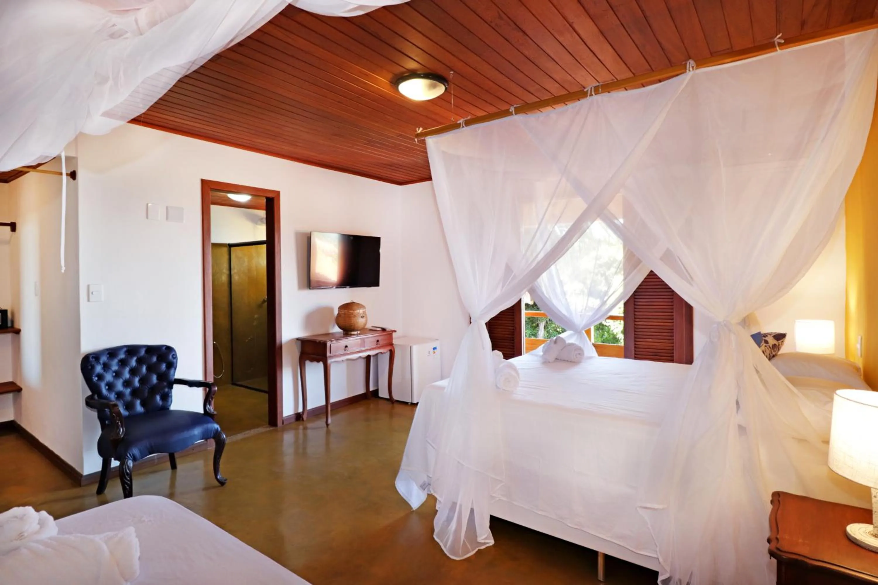 Bed in Pousada Arraial Colonial, Localizada no Centrinho e de Fácil Acesso a Praia e a Rua Mucugê