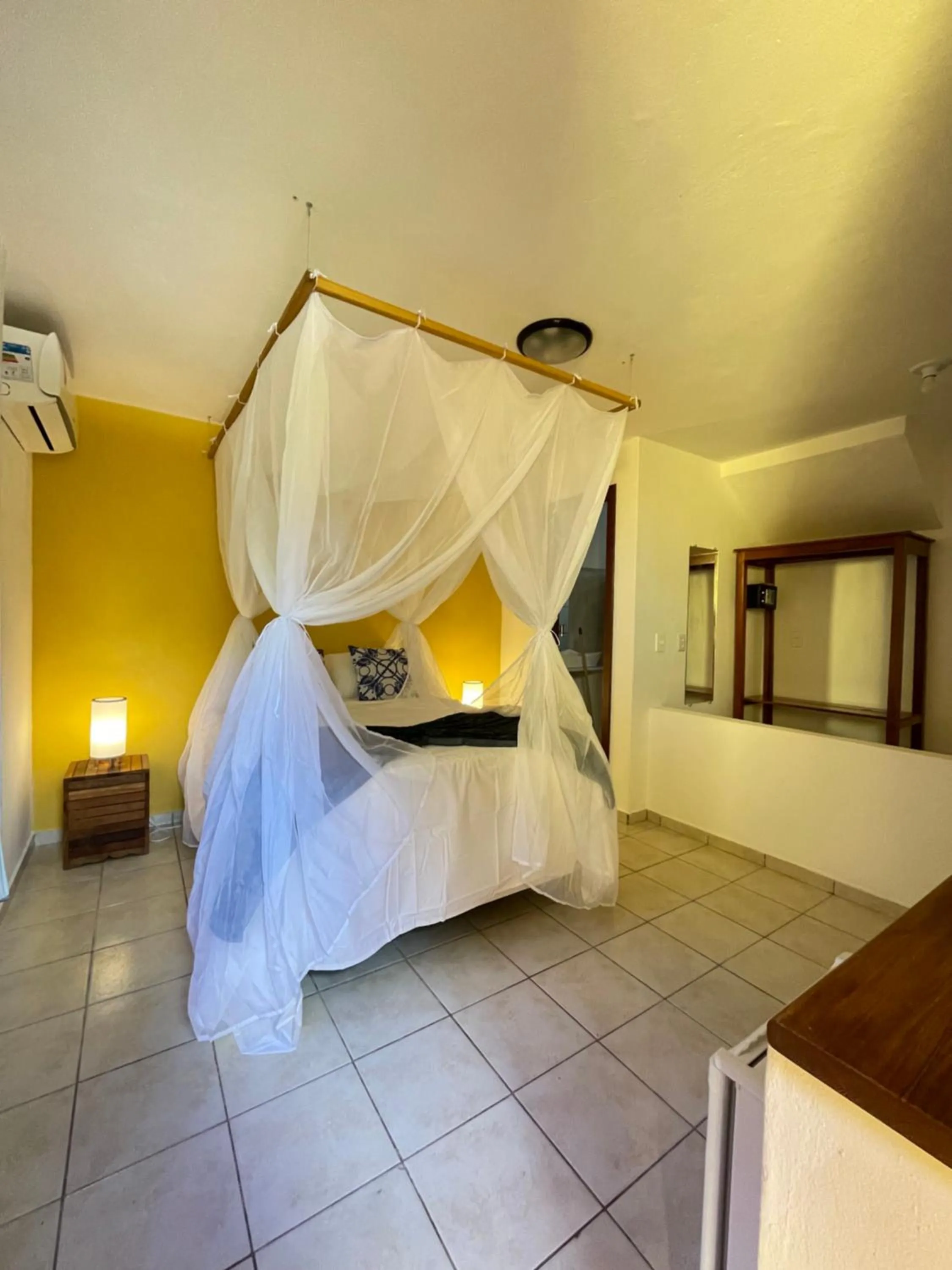 Bed in Pousada Arraial Colonial, Localizada no Centrinho e de Fácil Acesso a Praia e a Rua Mucugê