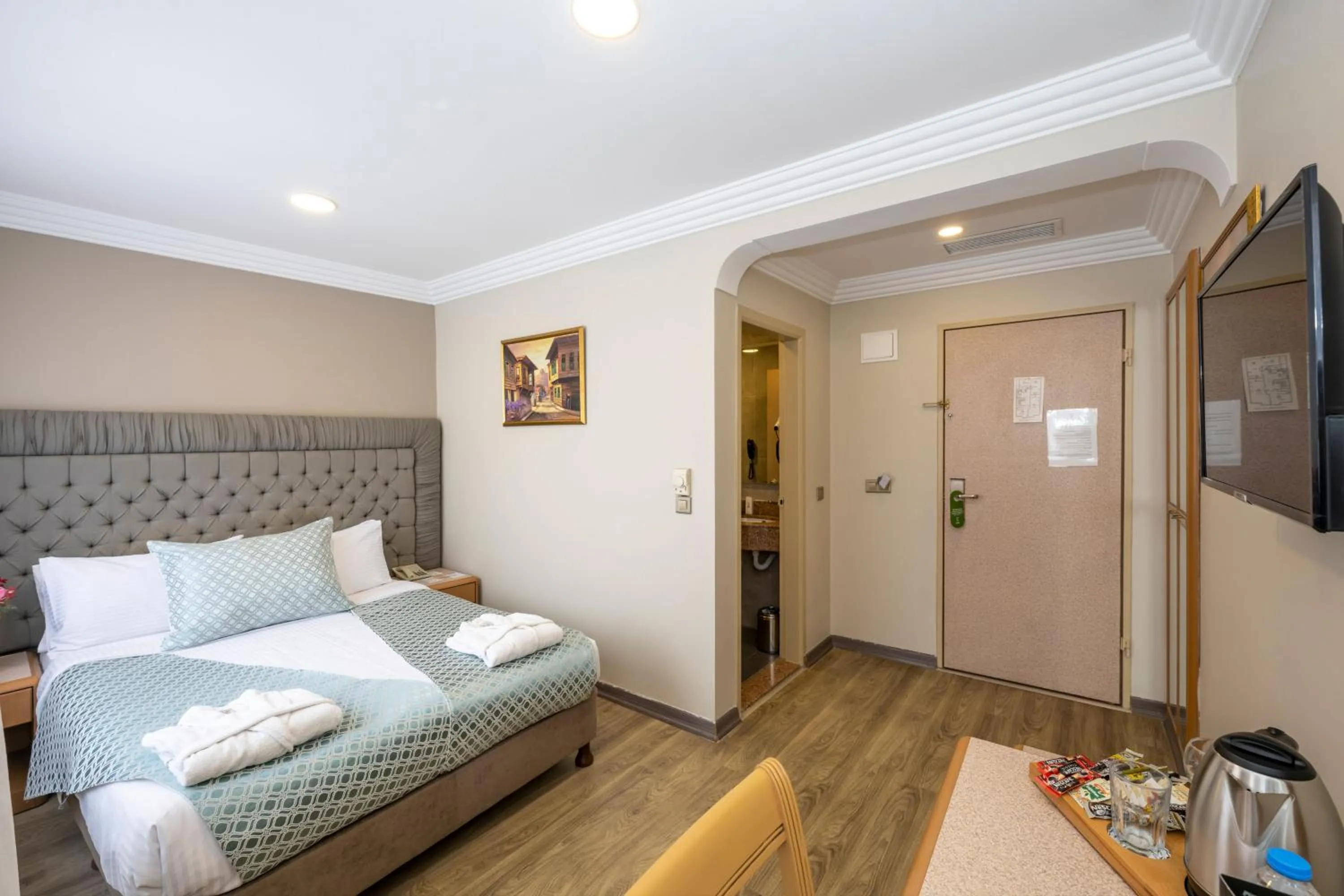 Bed in Grand Anka Hotel