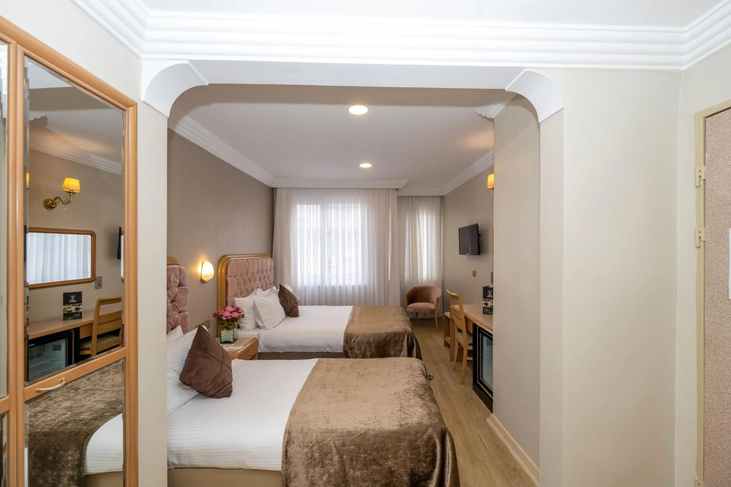 Bed in Grand Anka Hotel