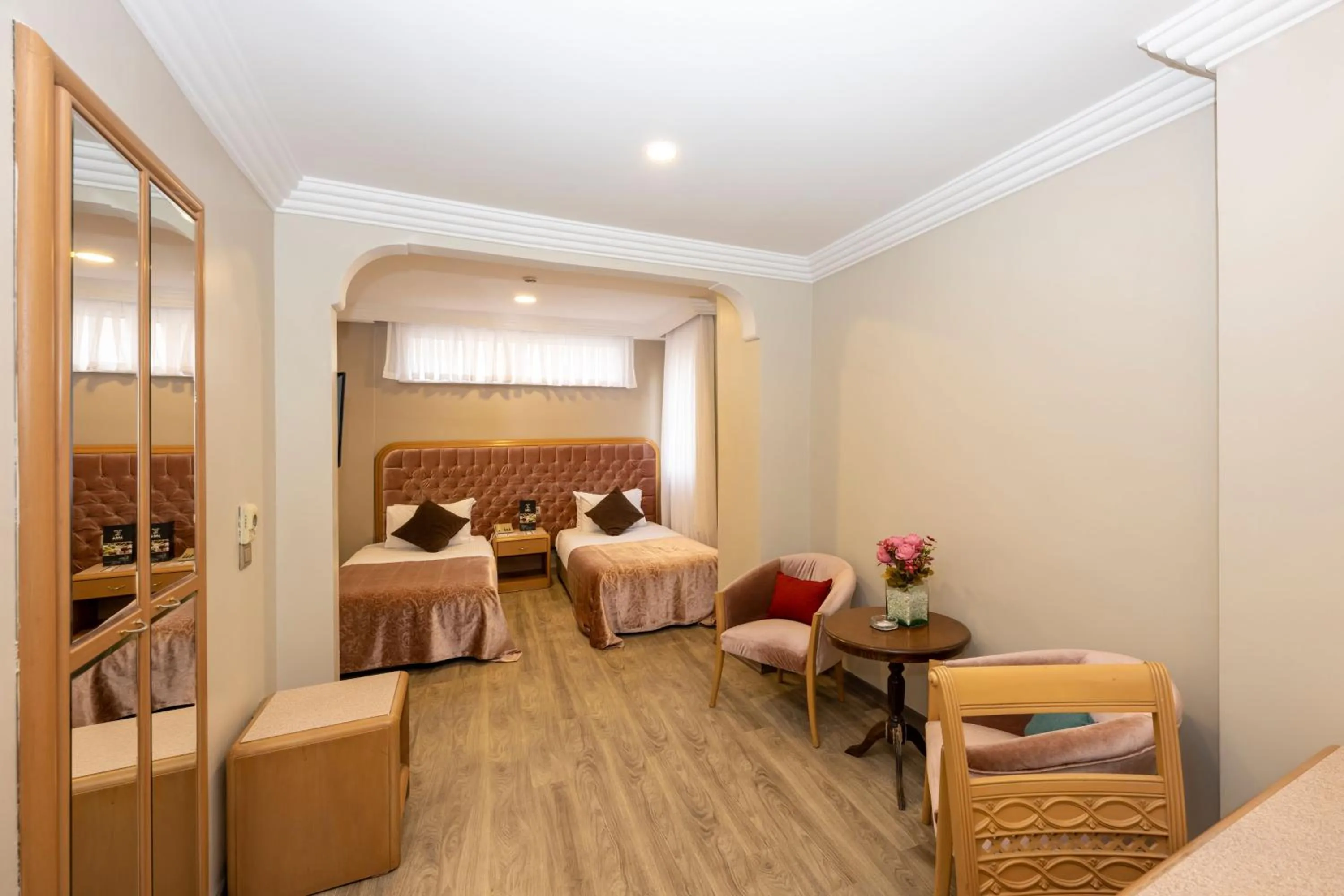 Seating area, Bed in Grand Anka Hotel