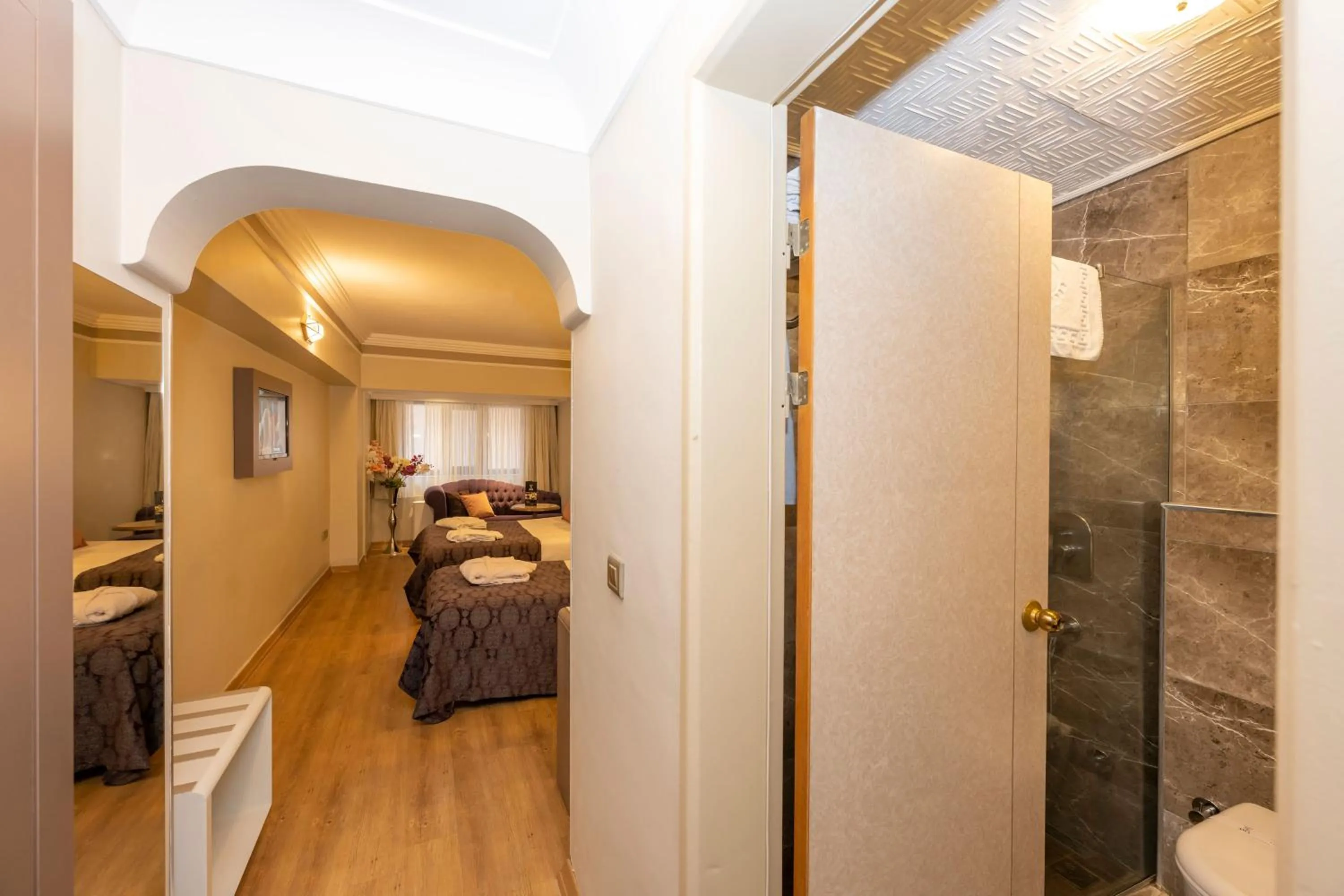 Photo of the whole room, Bed in Grand Anka Hotel