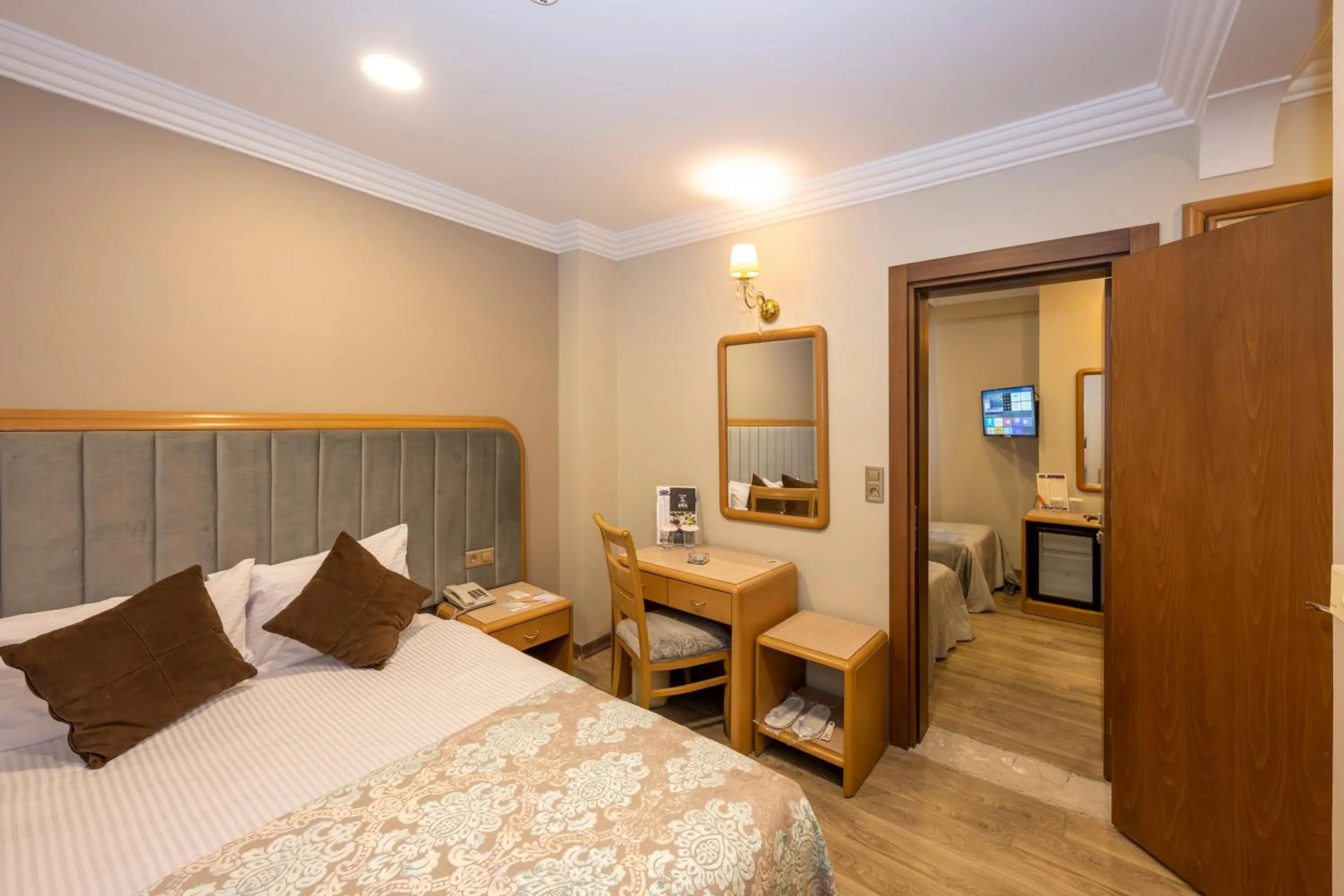 Bed in Grand Anka Hotel