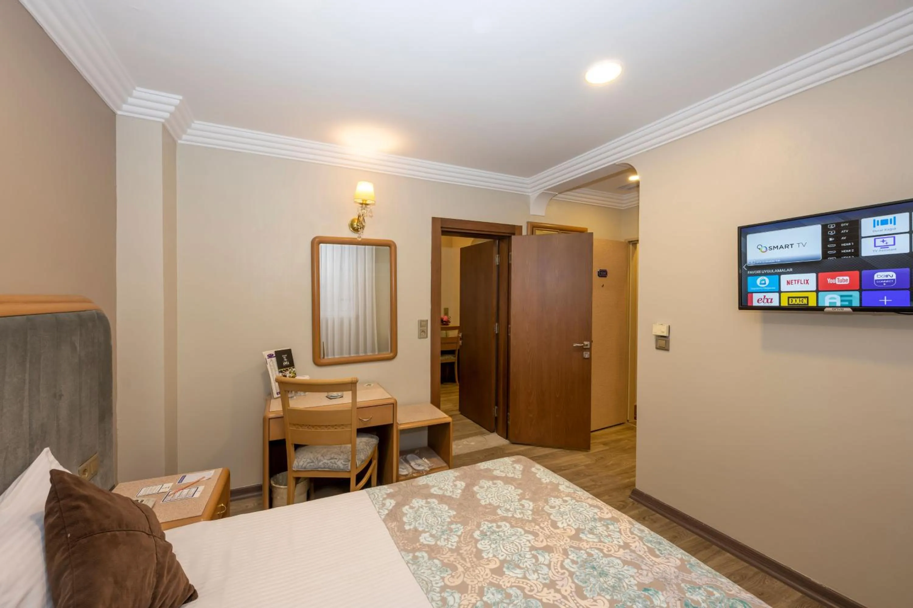 Bed in Grand Anka Hotel