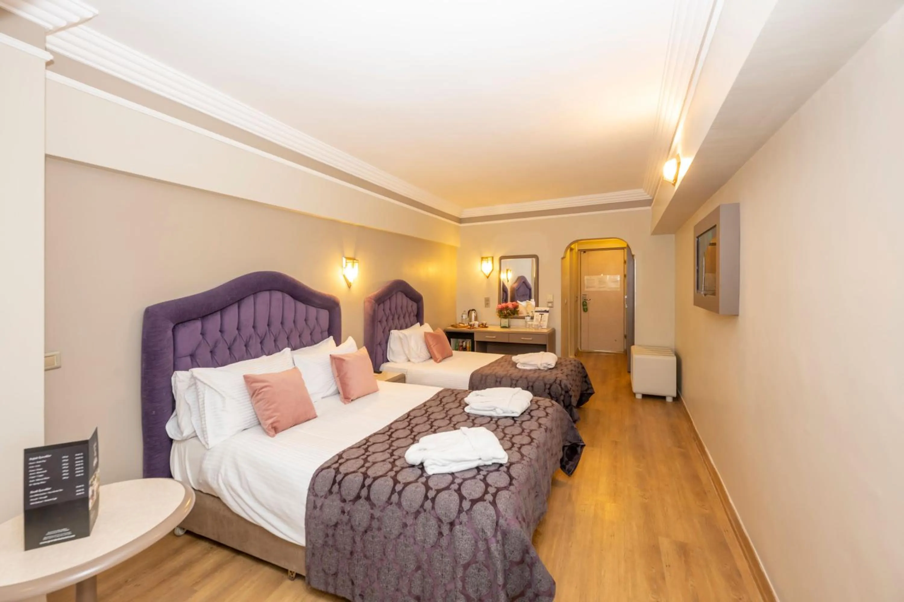 Bed in Grand Anka Hotel