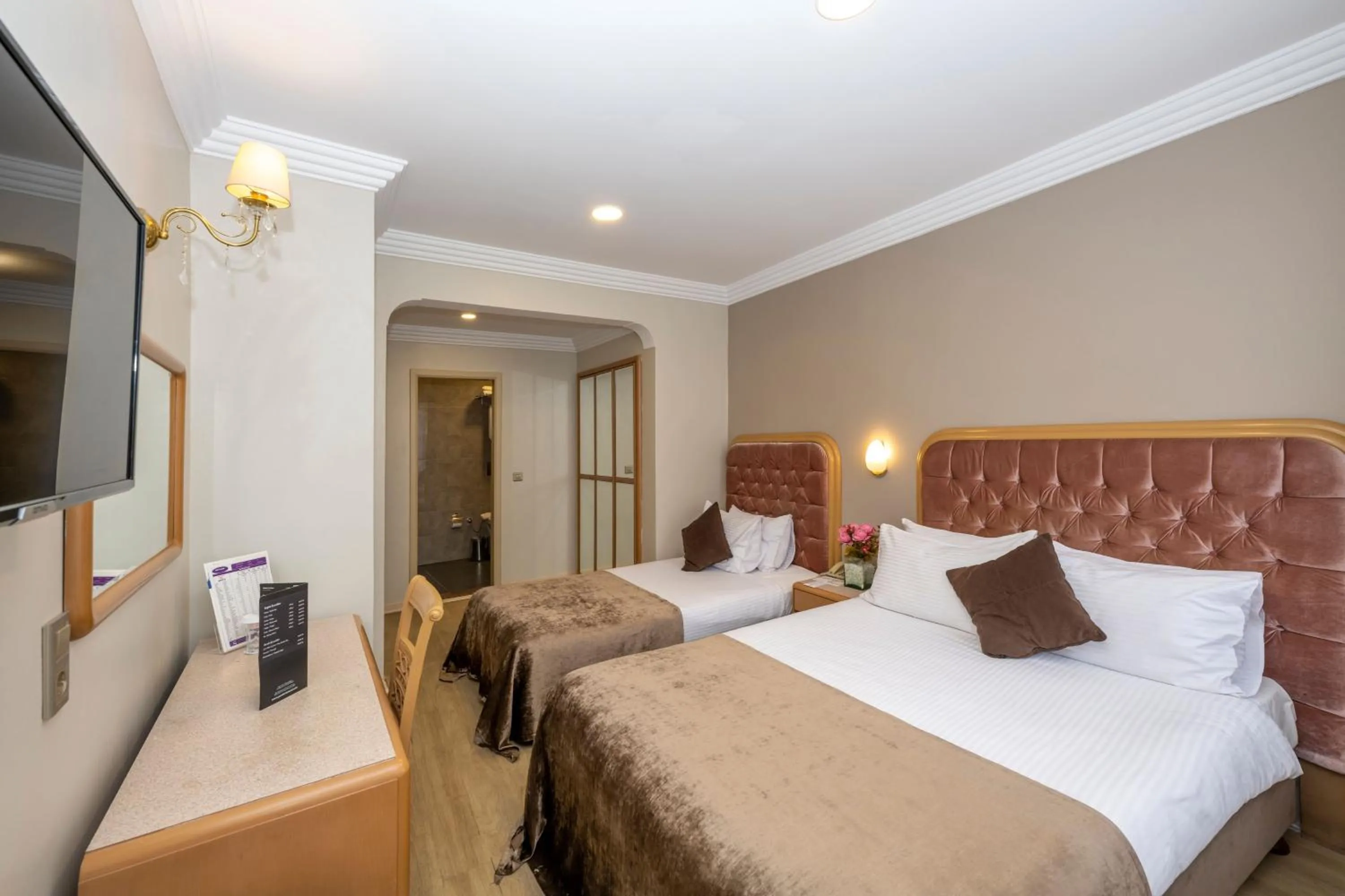 Photo of the whole room, Bed in Grand Anka Hotel