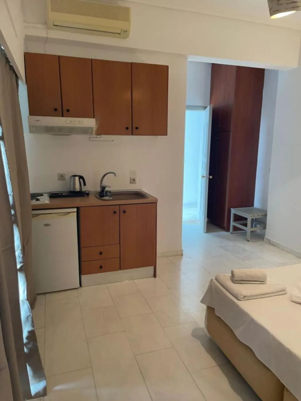 Kitchen or kitchenette in Hotel Kourkoumelata
