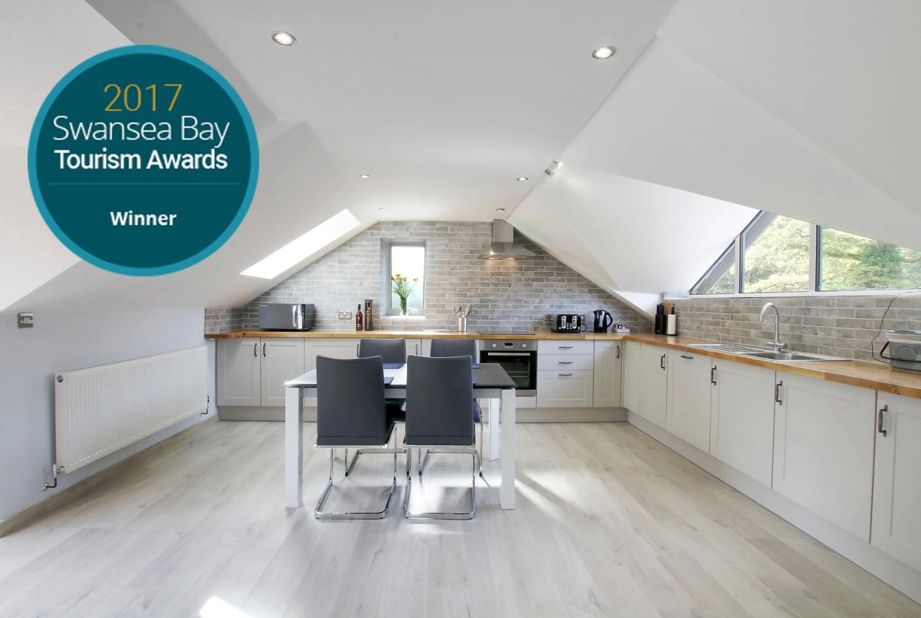 Kitchen or kitchenette in Swansea Valley Holiday Cottages