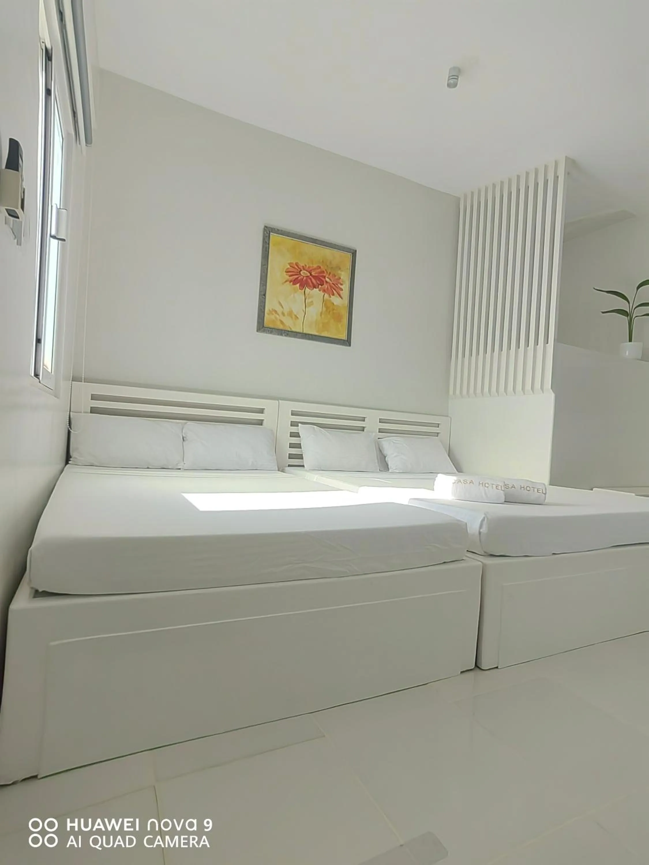 Bed in Mecasa Hotel