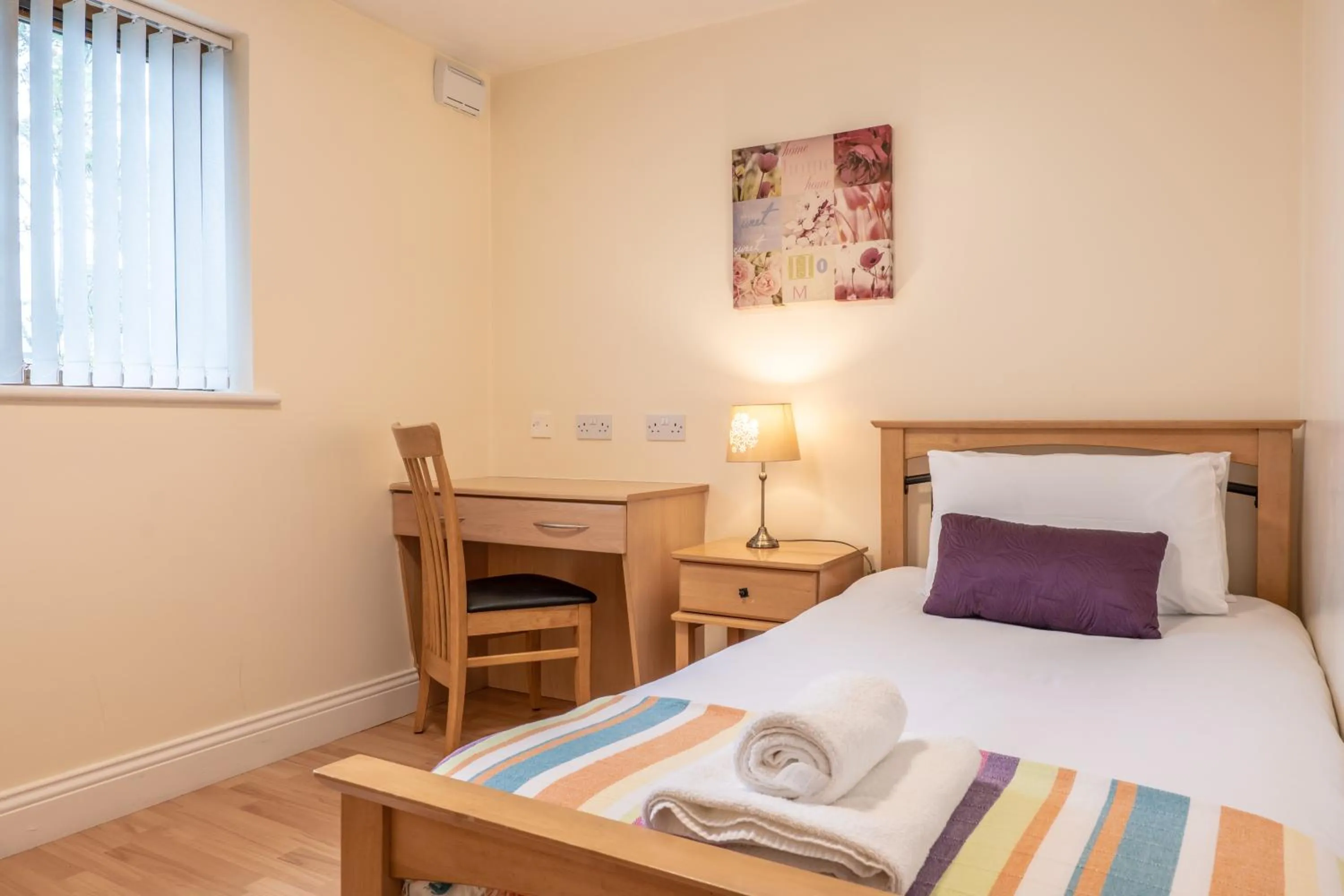 Bed in Donegan Court Aparthotel