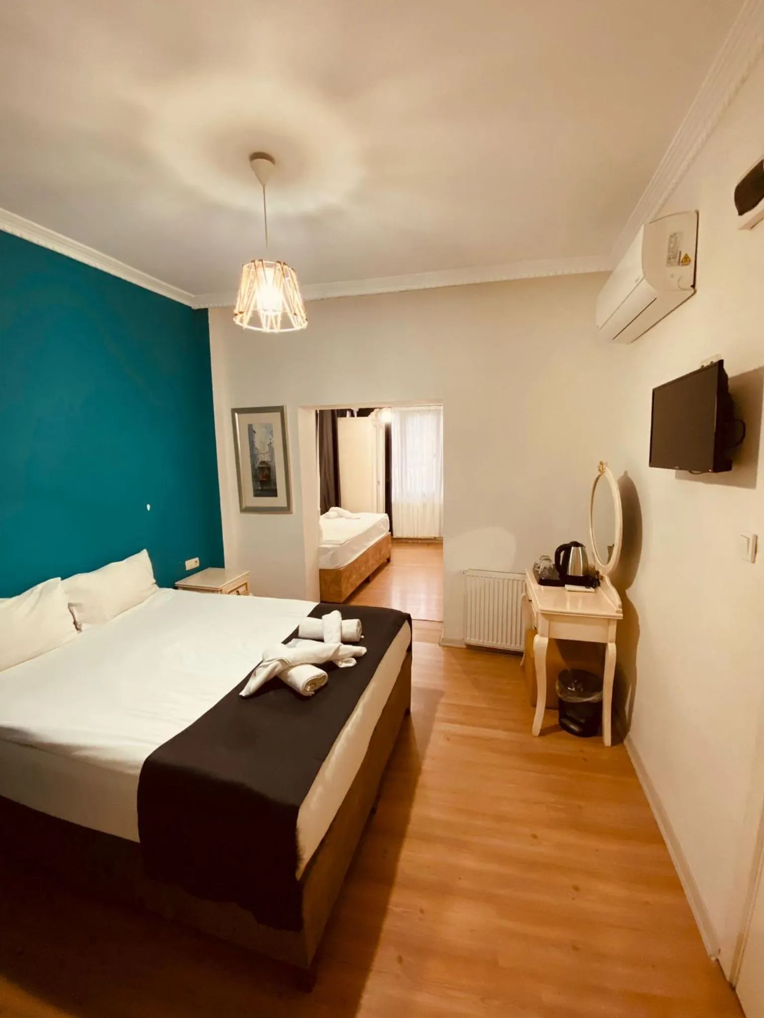 Photo of the whole room, Bed in Adora Hotel