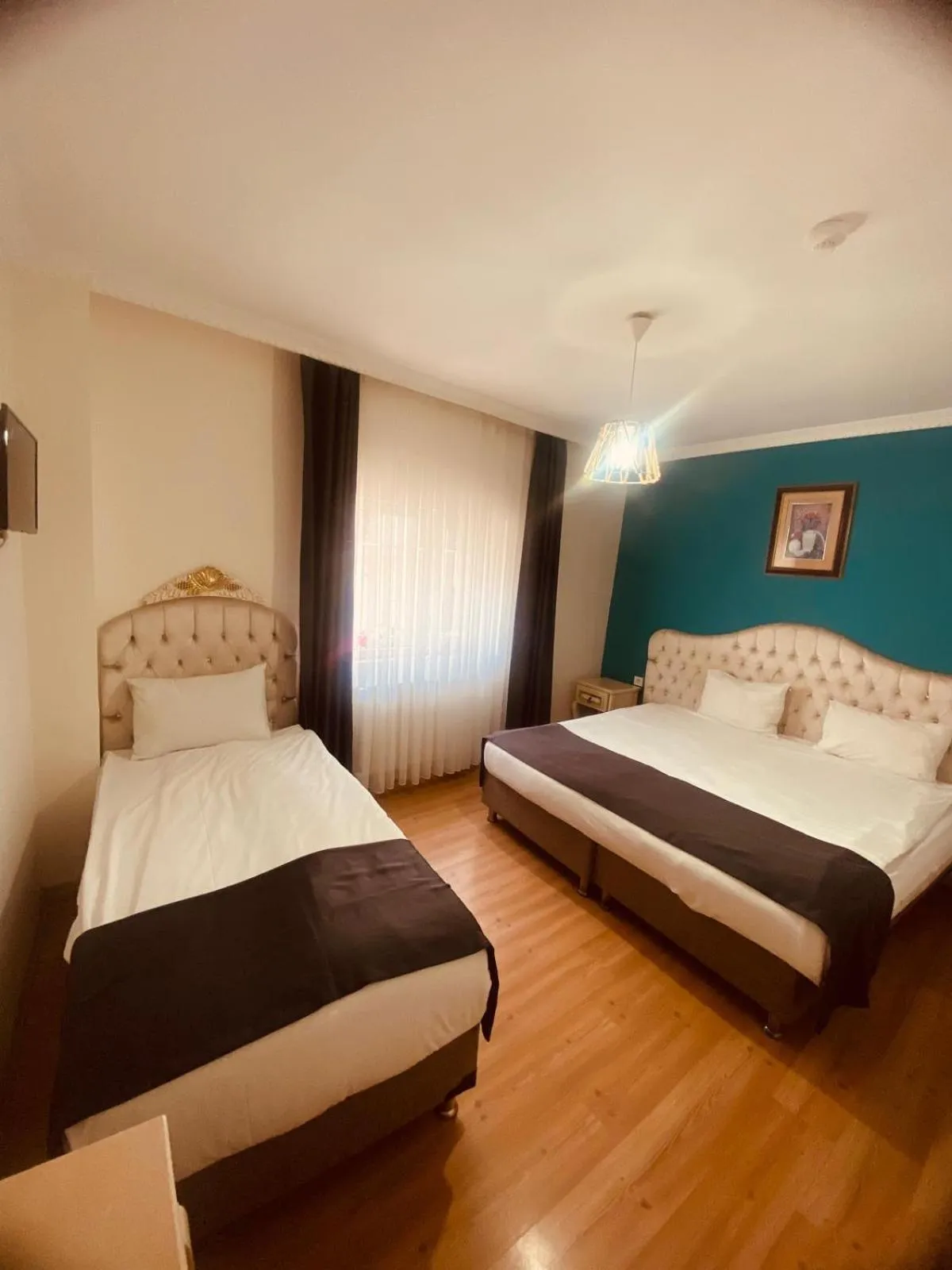 Photo of the whole room, Bed in Adora Hotel